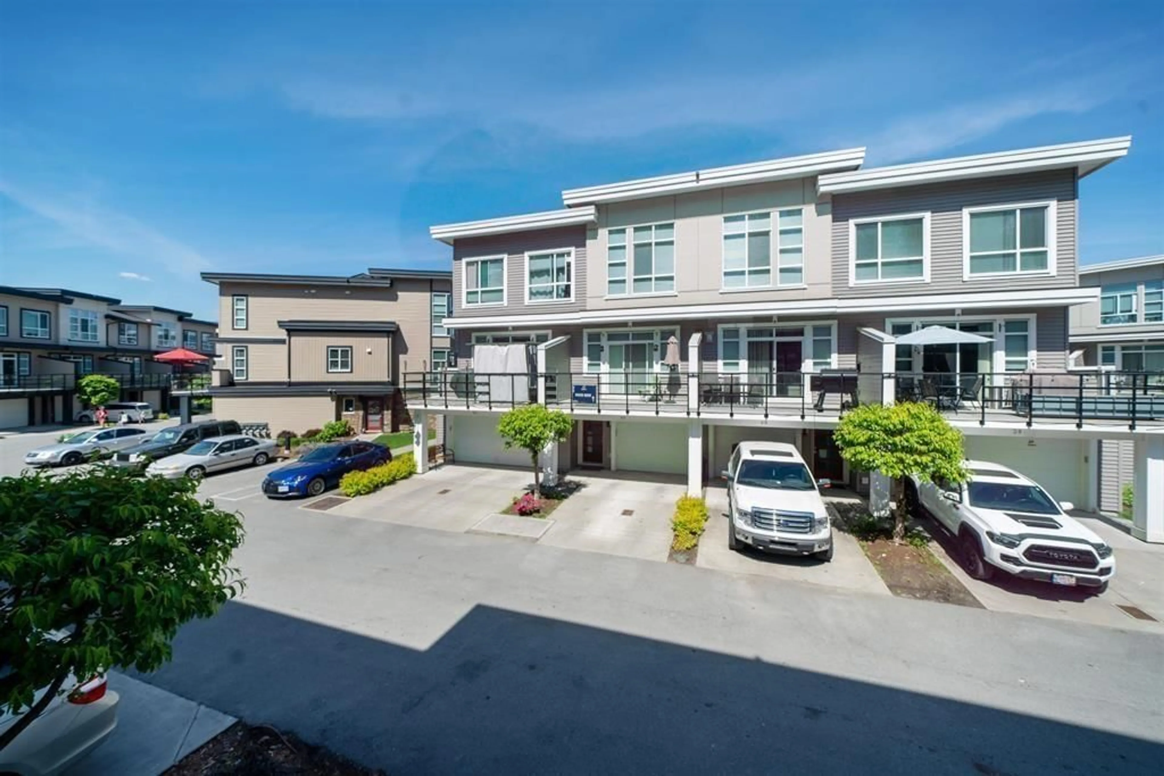 A pic from outside/outdoor area/front of a property/back of a property/a pic from drone, street for 45 - 8413 MIDTOWN WAY, Chilliwack British Columbia V2P0G7