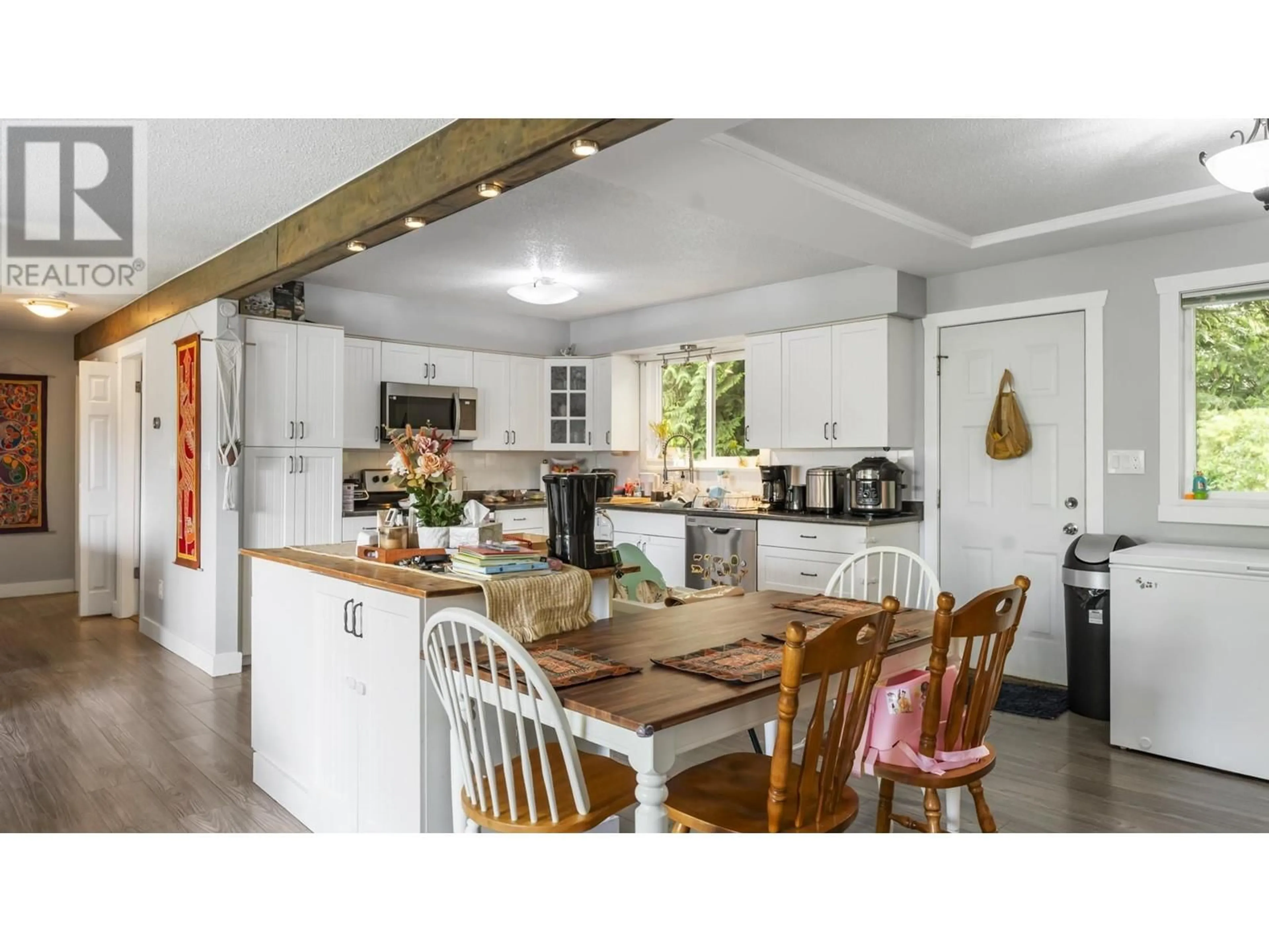 Open concept kitchen, wood/laminate floor for 22738 124 AVENUE, Maple Ridge British Columbia V2X4K1