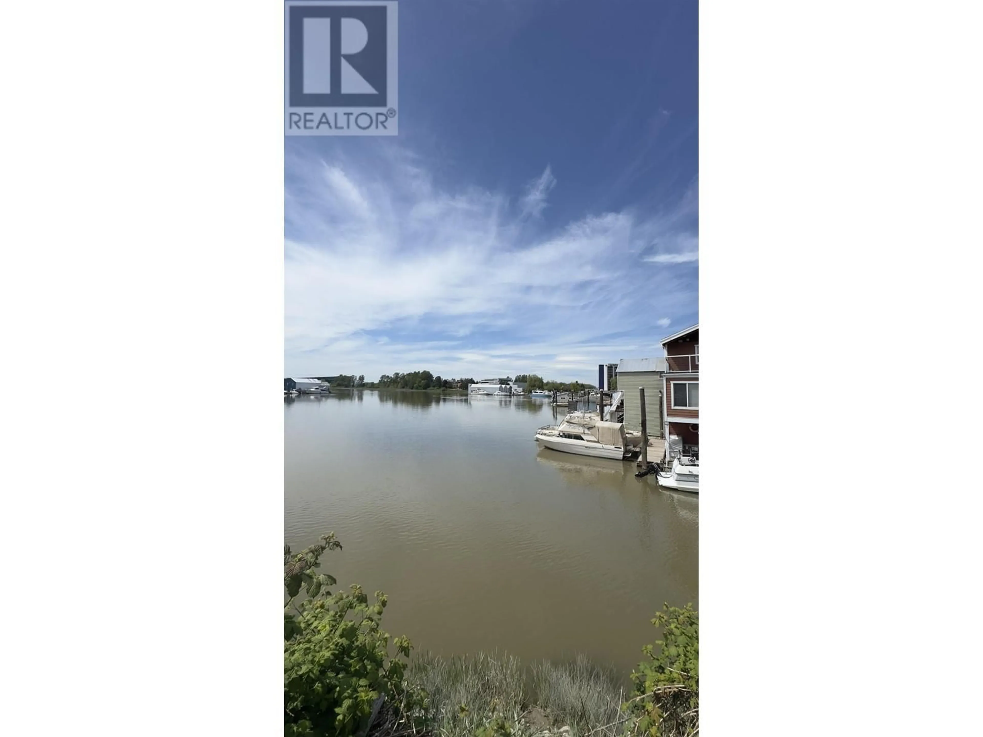 A pic from outside/outdoor area/front of a property/back of a property/a pic from drone, water/lake/river/ocean view for 111 - 8191 RIVER ROAD, Richmond British Columbia V6X1X8