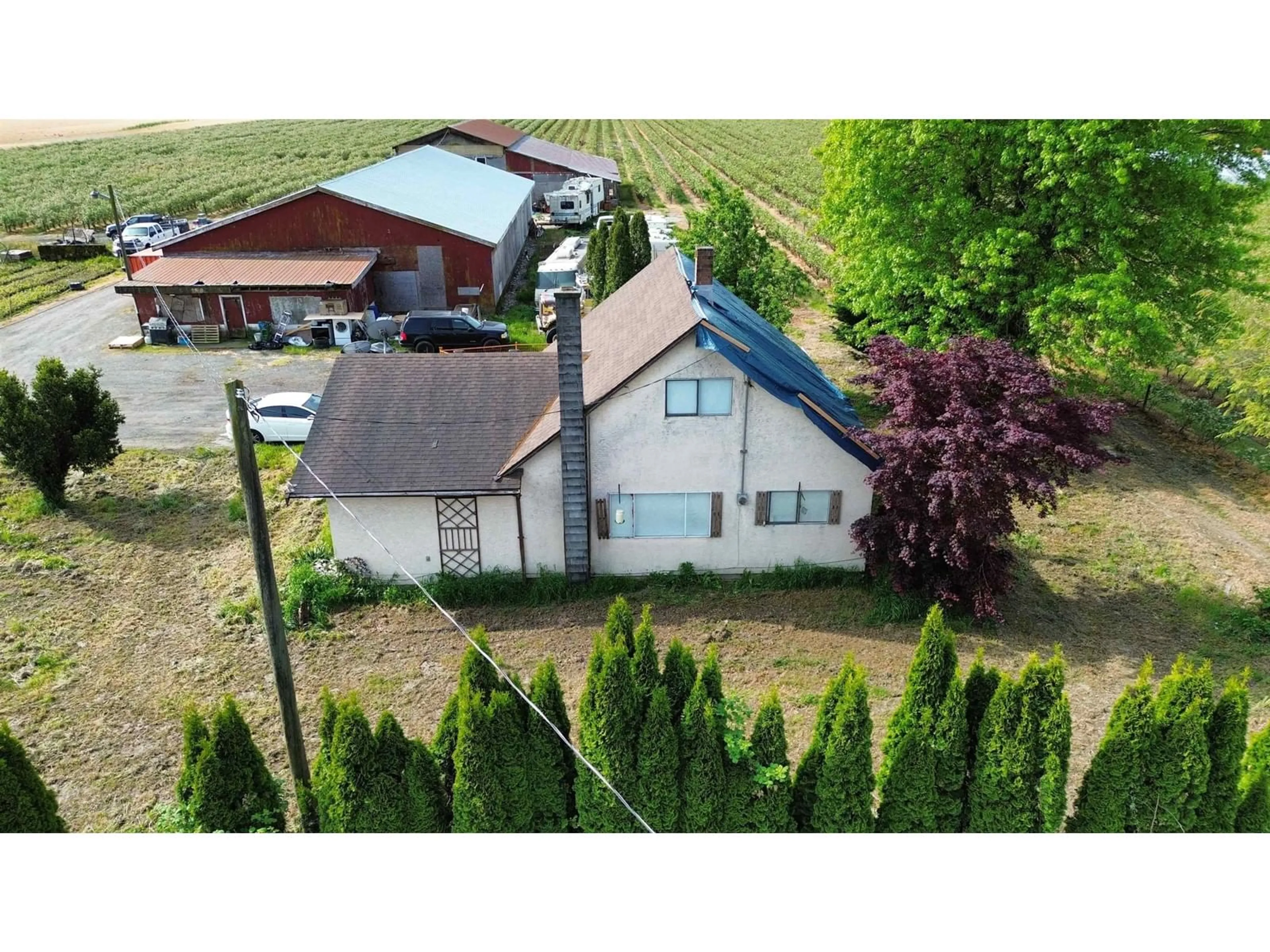 A pic from outside/outdoor area/front of a property/back of a property/a pic from drone, mountain view for 41750 KEITH WILSON ROAD, Chilliwack British Columbia V2R4B2