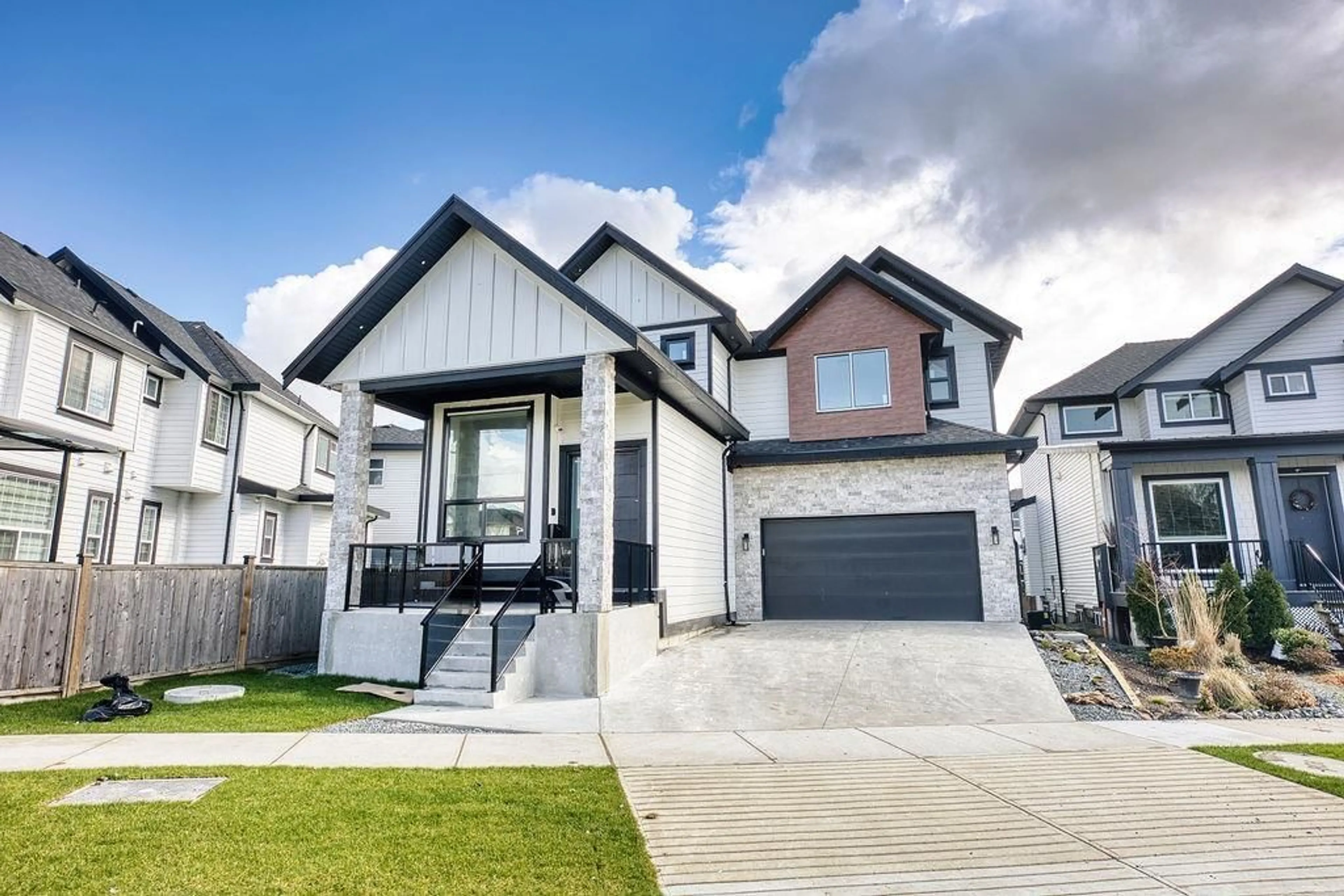 Home with vinyl exterior material, street for 7080 192A, Surrey British Columbia V4N6V1