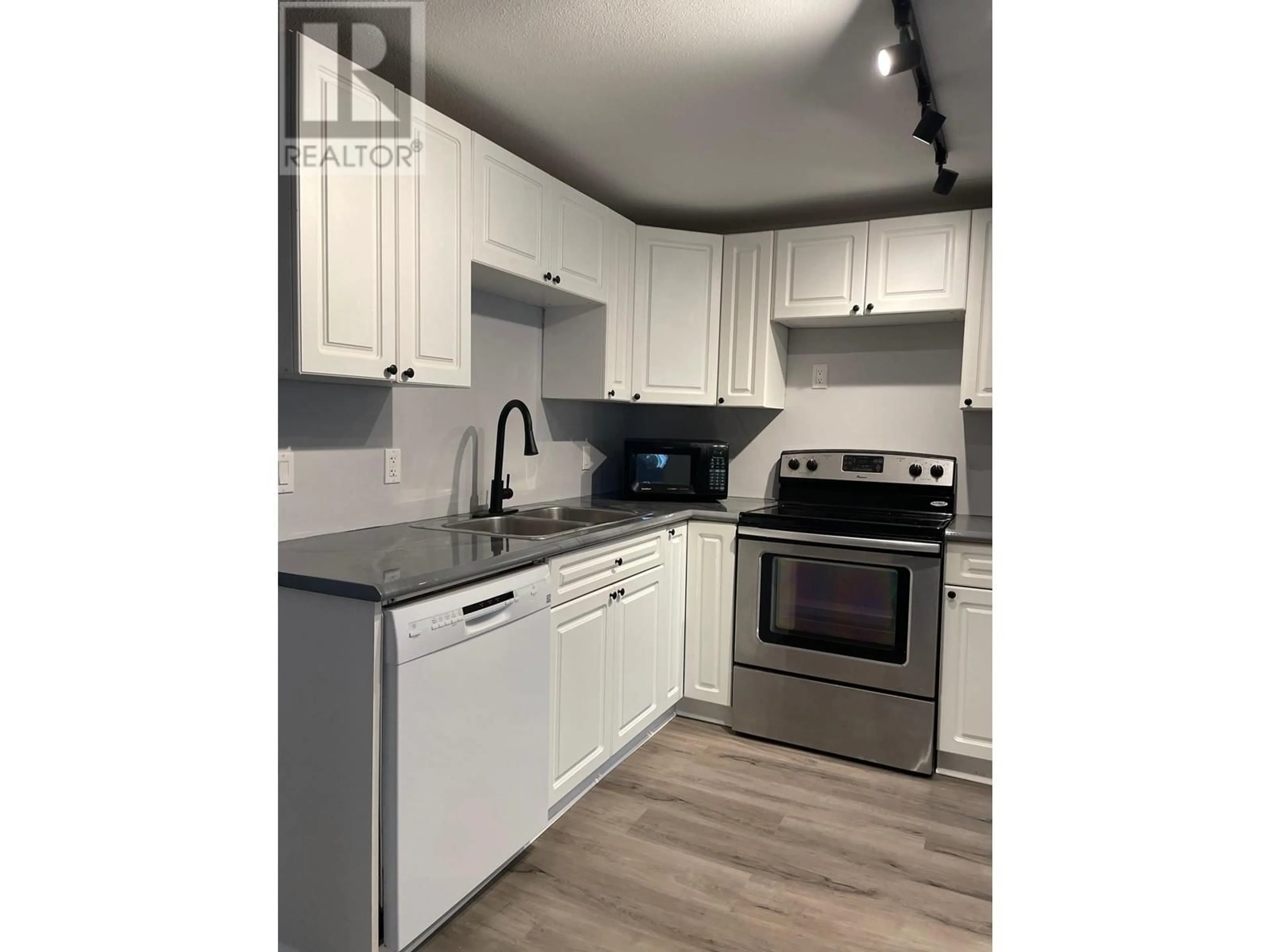 Standard kitchen, wood/laminate floor for 4423 53 AVENUE, Fort Nelson British Columbia V0C1R0