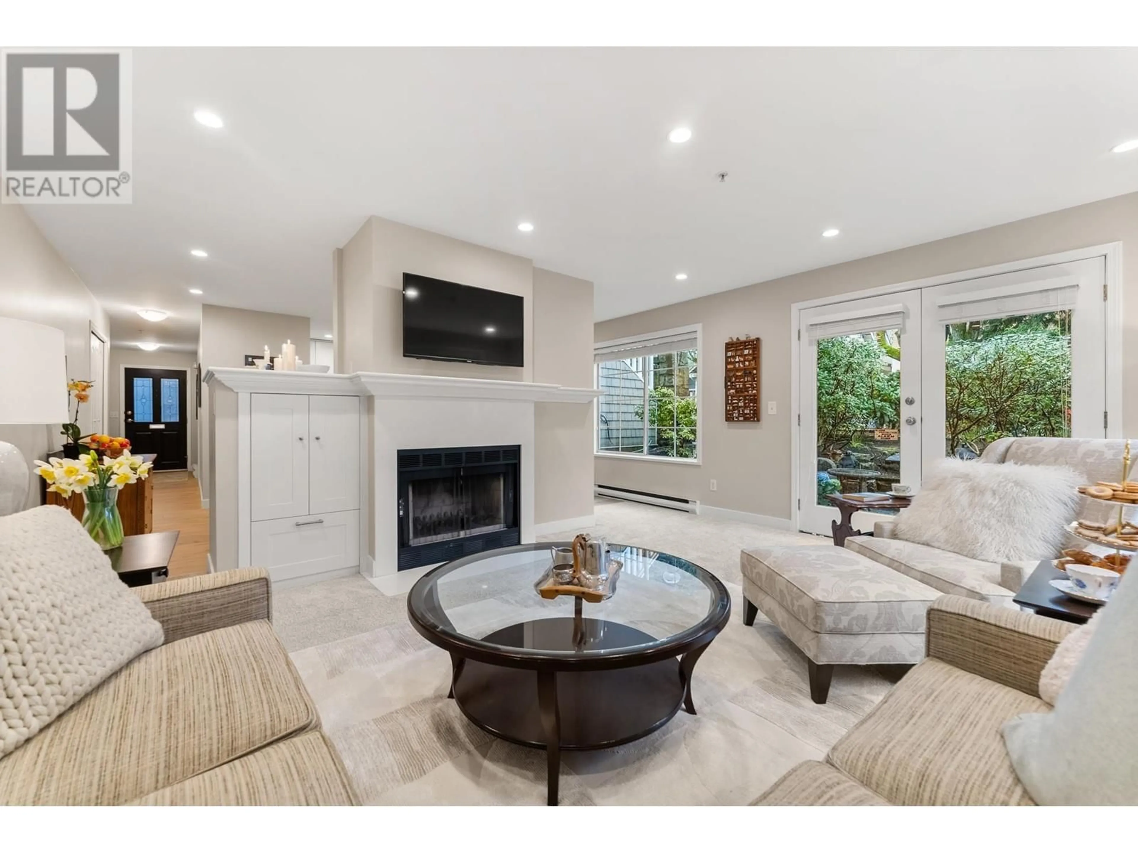 Living room with furniture, ceramic/tile floor for 1816 COLLINGWOOD STREET, Vancouver British Columbia V6R3K5