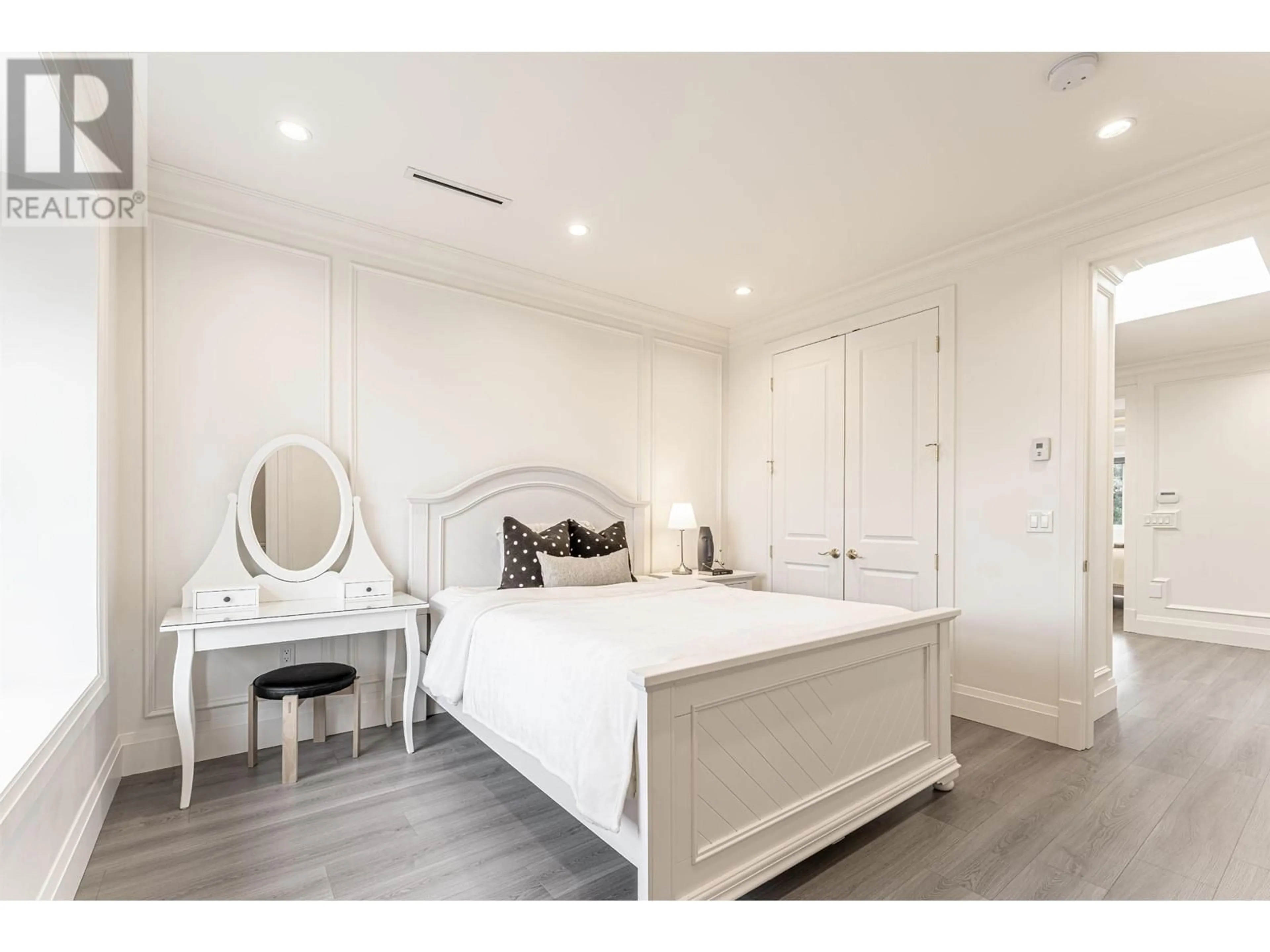 Bedroom with bed, wood/laminate floor for 4640 FOXGLOVE CRESCENT, Richmond British Columbia V7C2K3