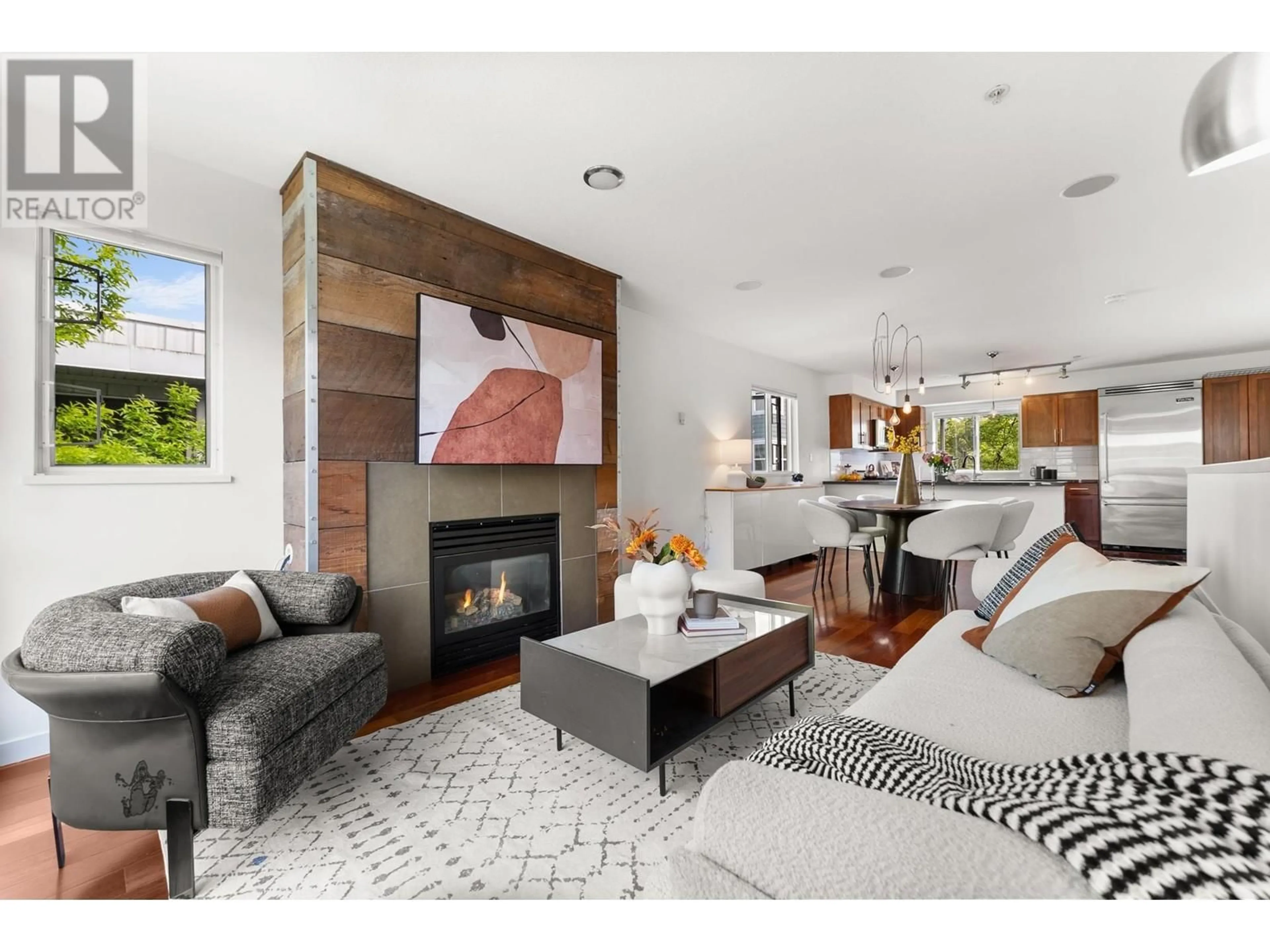Living room with furniture, wood/laminate floor for 213 - 672 6TH AVENUE, Vancouver British Columbia V5Z1A3