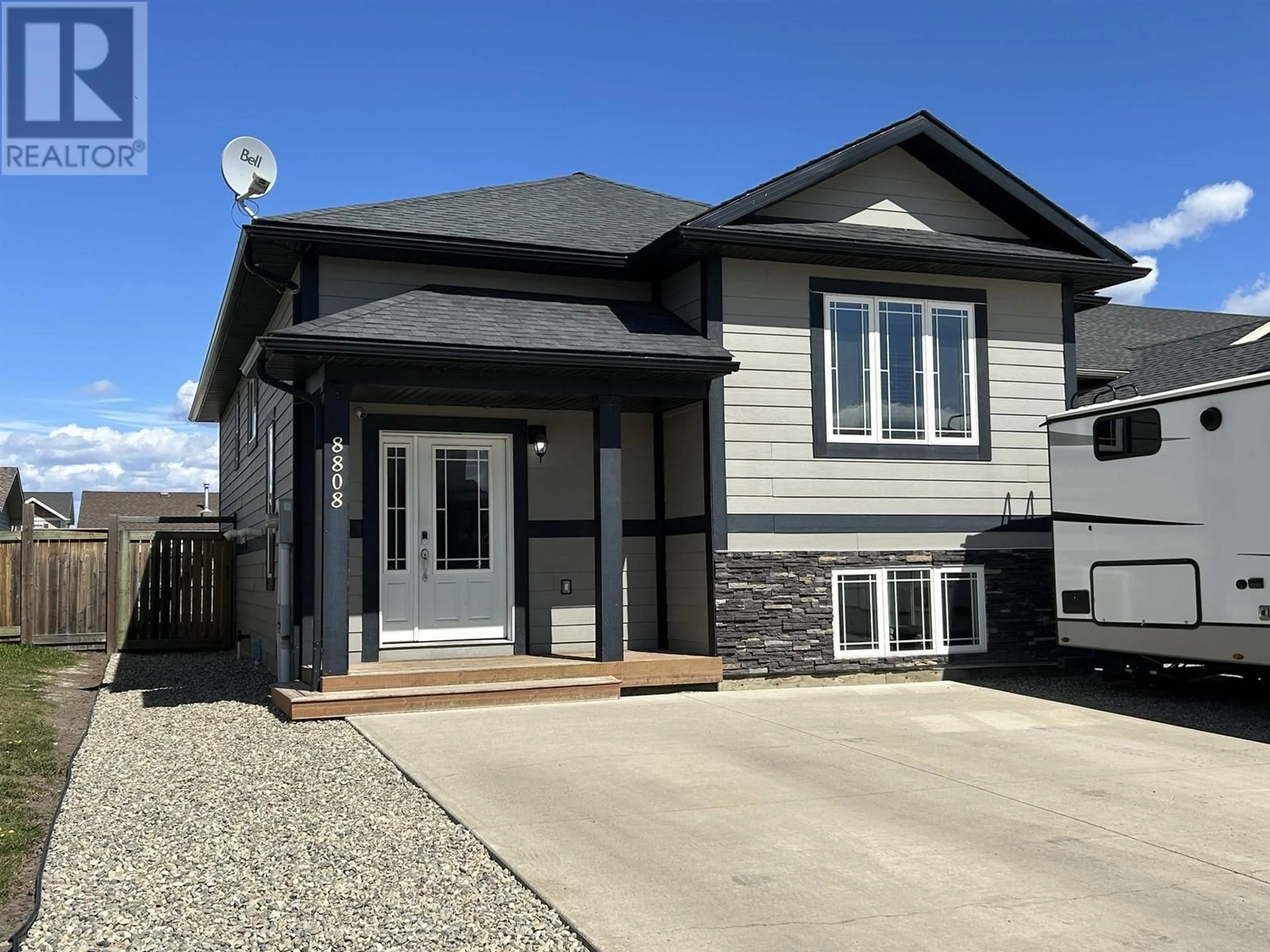 Home with vinyl exterior material, street for 8808 113 AVENUE, Fort St. John British Columbia V1J0E2