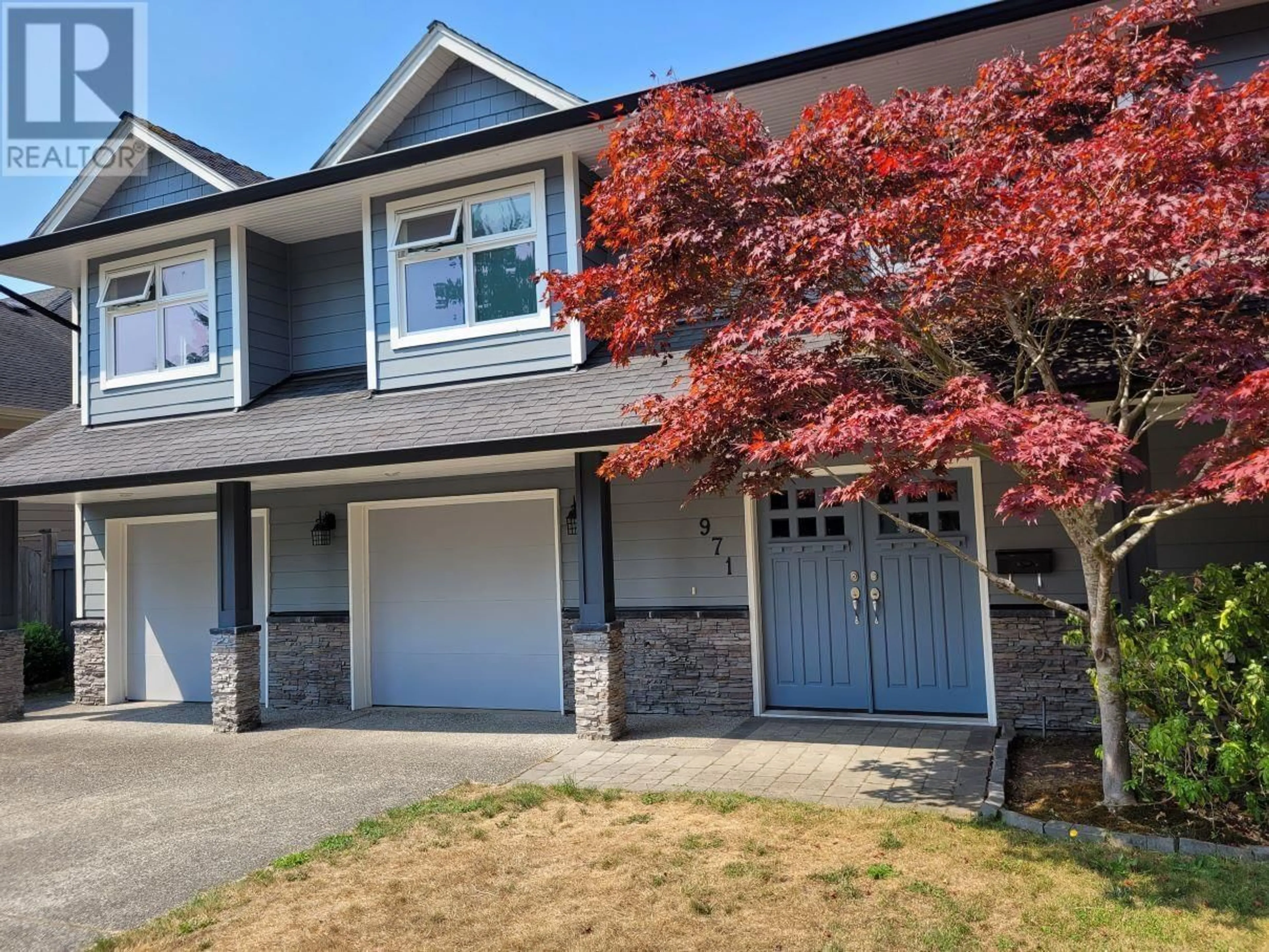 Home with vinyl exterior material, street for 971 51A STREET, Delta British Columbia V4M2X9