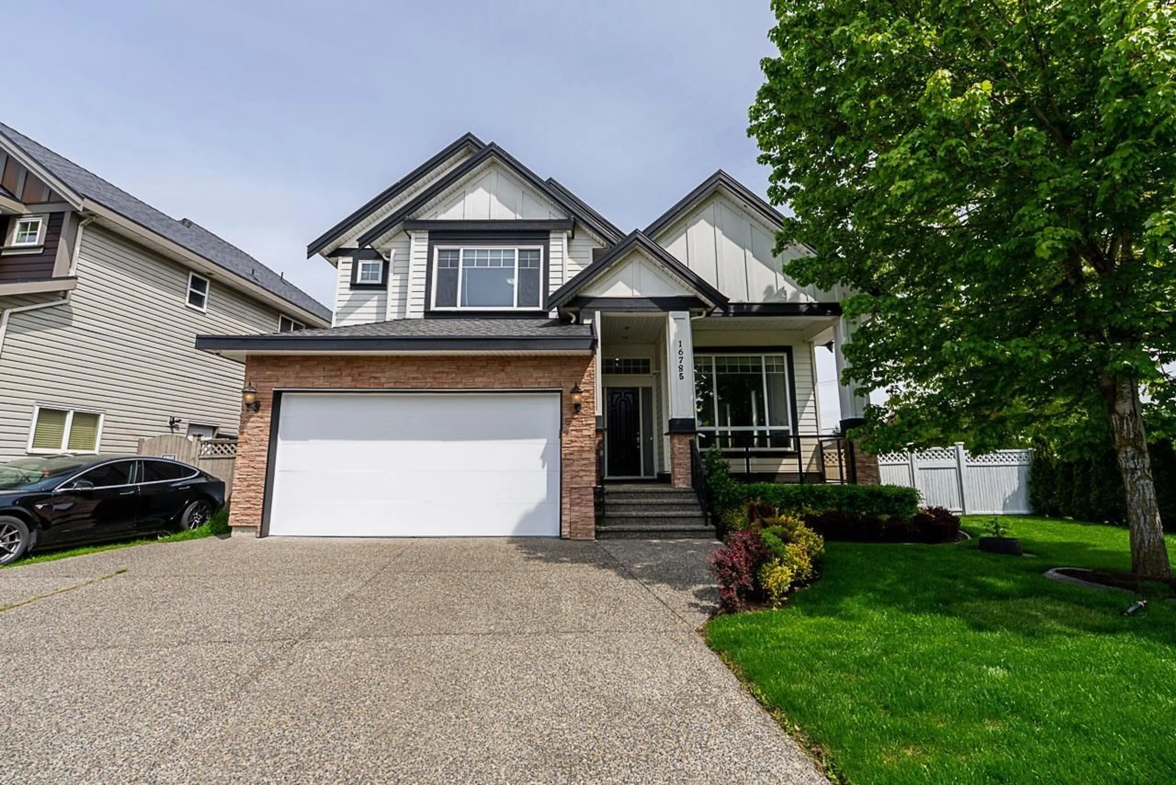 Home with vinyl exterior material, street for 16785 58B, Surrey British Columbia V3S2K3