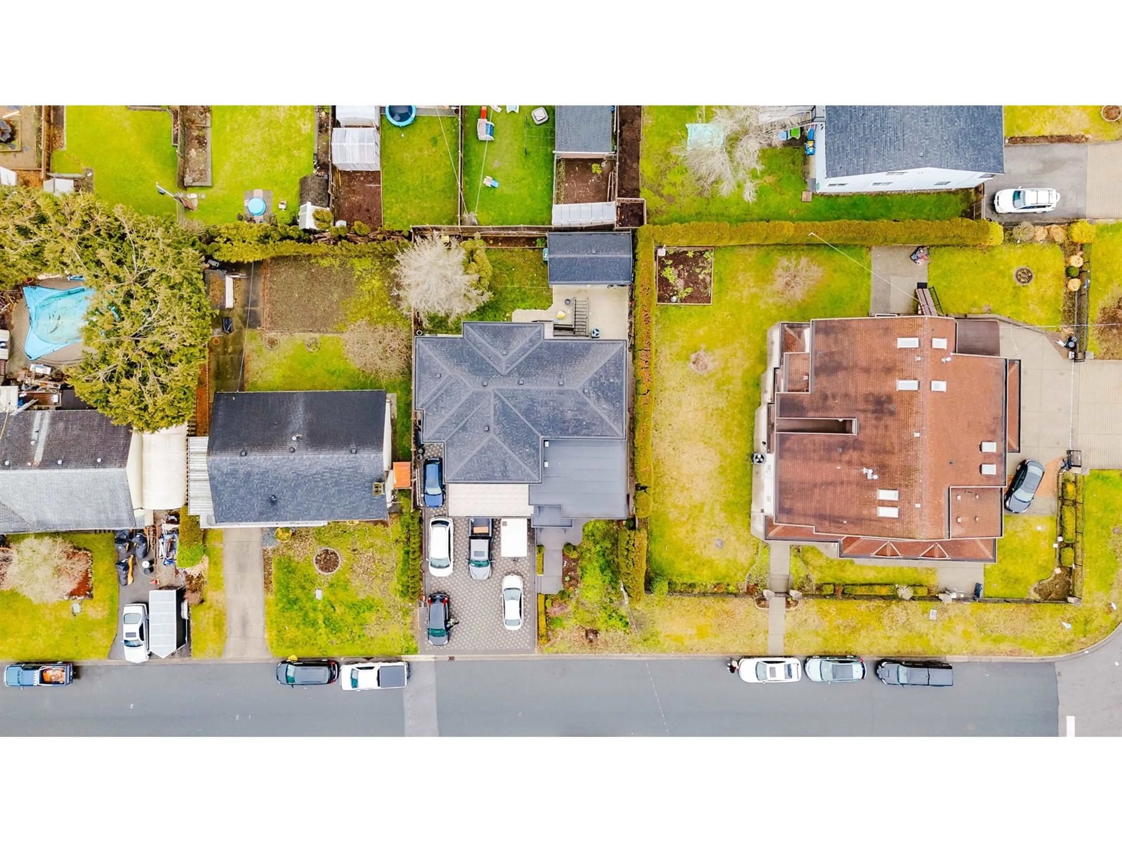 A pic from outside/outdoor area/front of a property/back of a property/a pic from drone, street for 11467 76A, Delta British Columbia V4C1L5