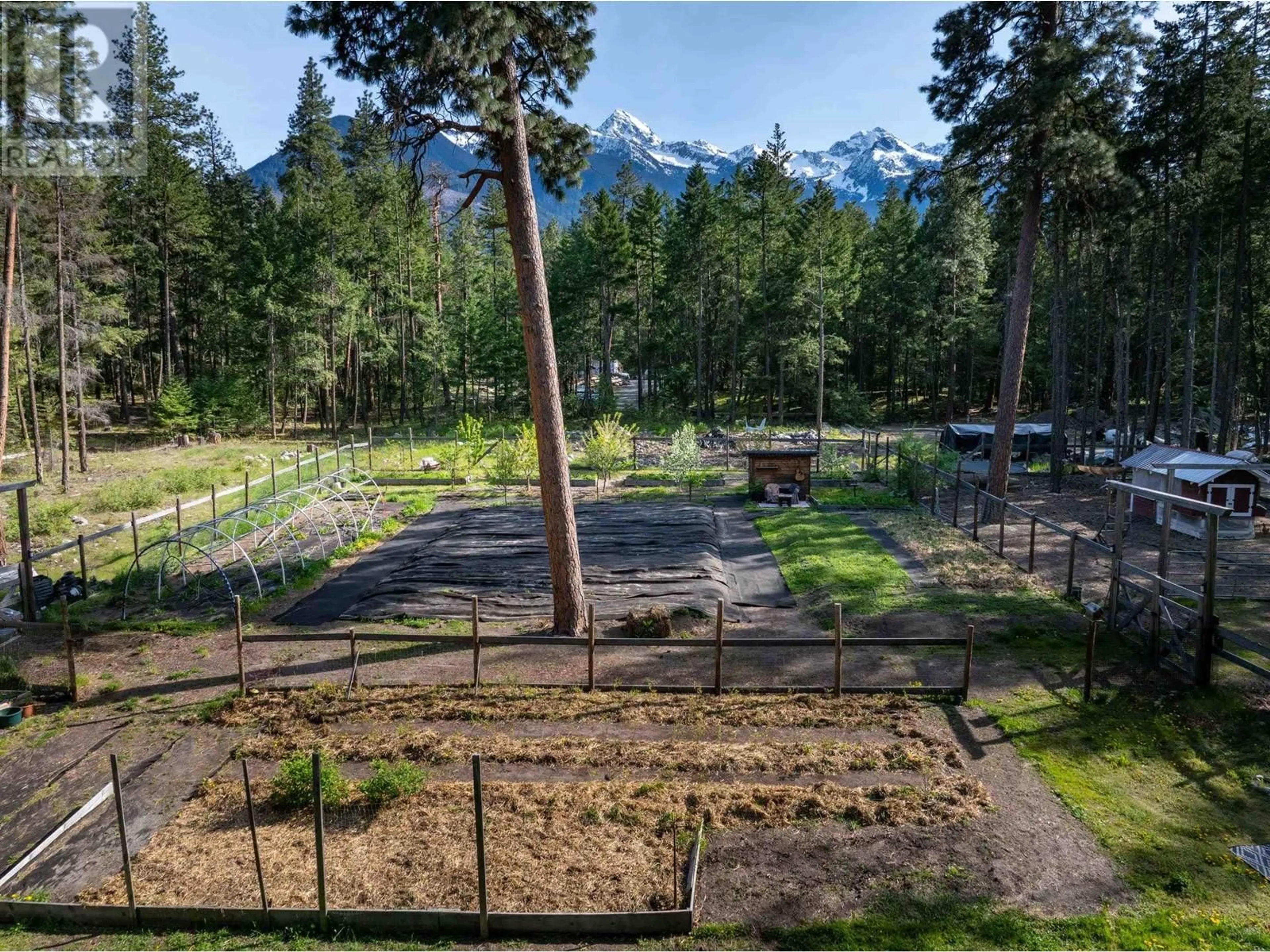 A pic from outside/outdoor area/front of a property/back of a property/a pic from drone, mountain view for 6 - 9866 PEMBERTON PORTAGE ROAD, D'Arcy British Columbia V0N1L0