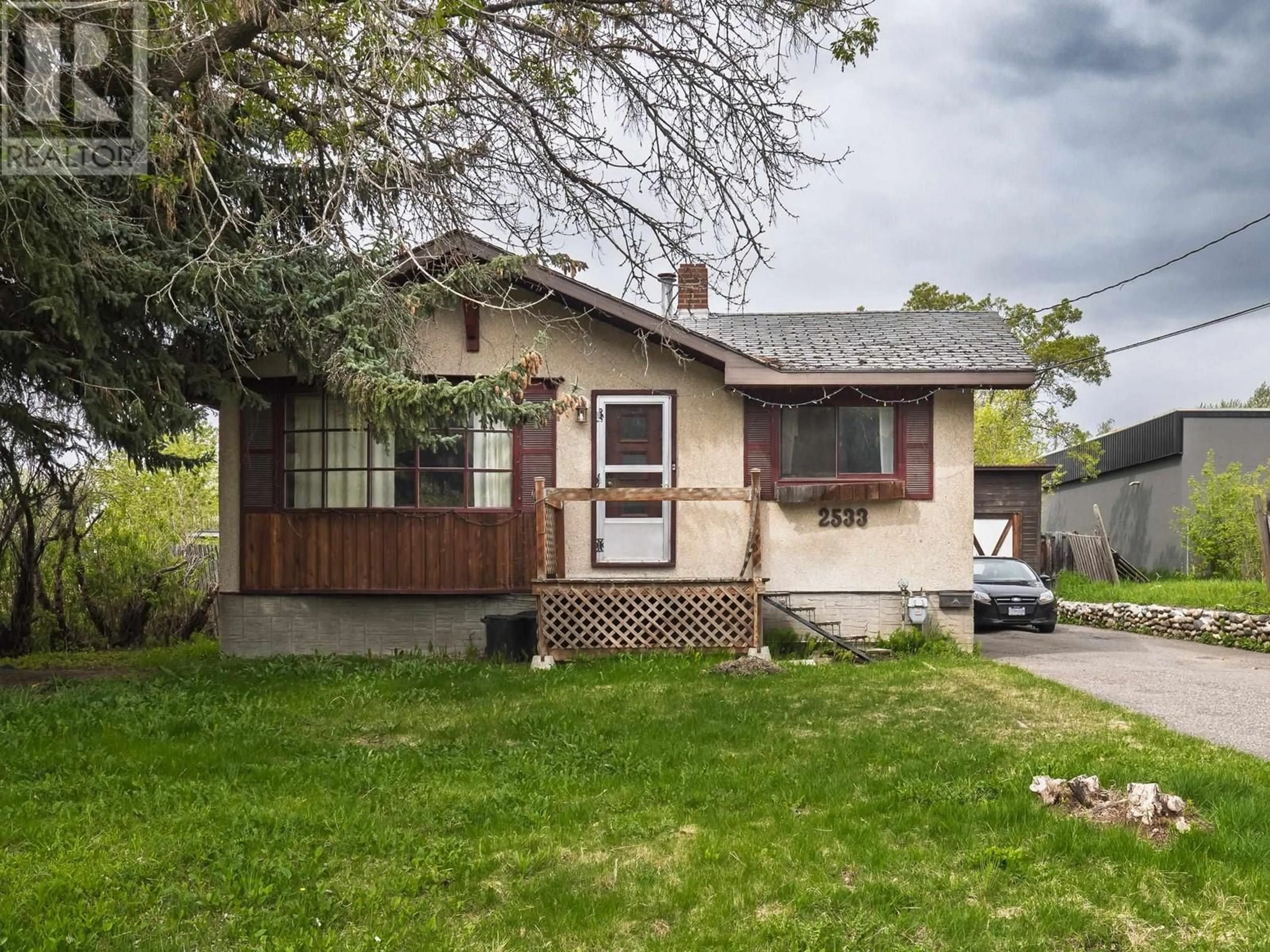 Home with vinyl exterior material, street for 2533 INLANDER STREET, Prince George British Columbia V2L1J6