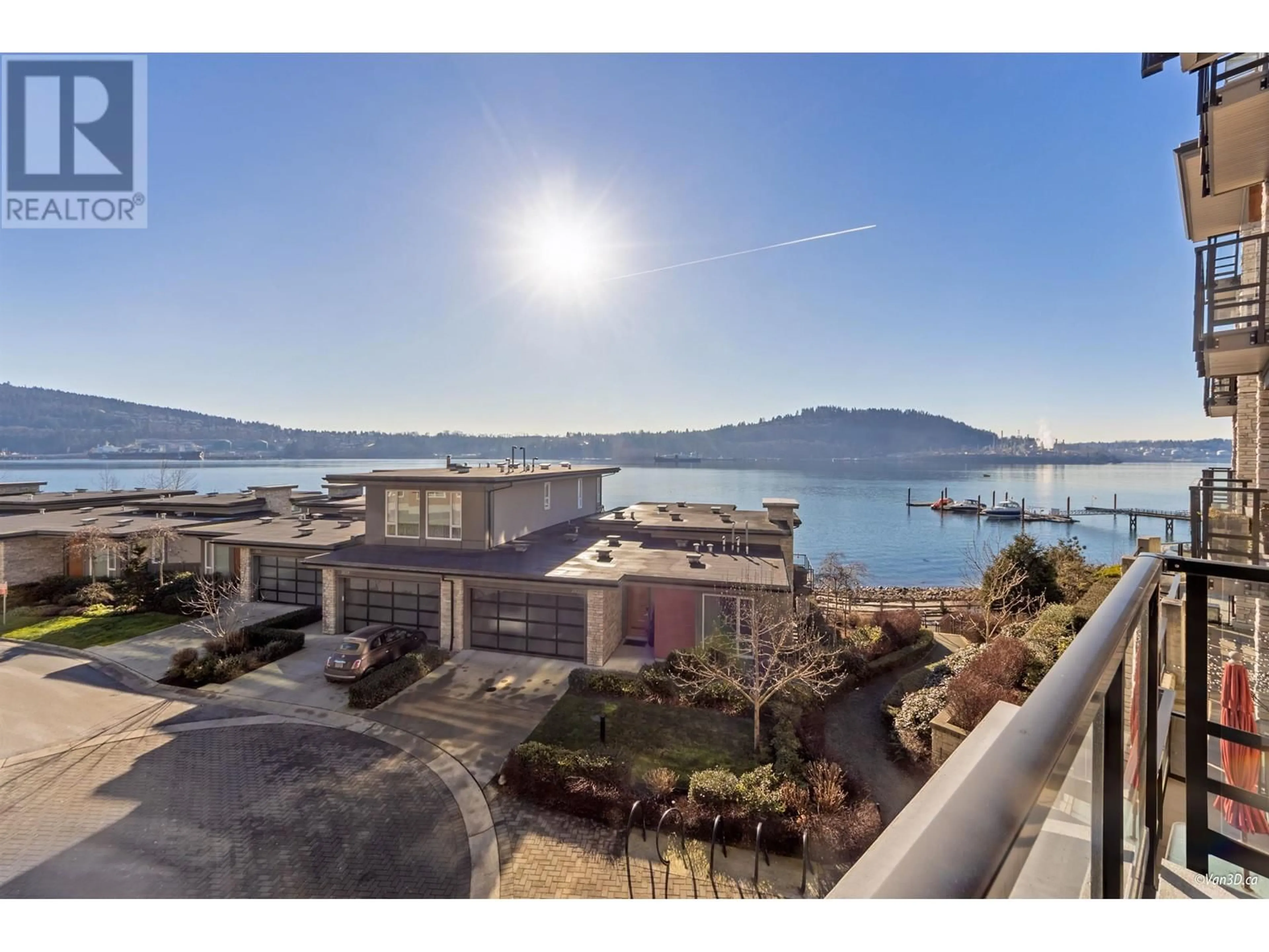 A pic from outside/outdoor area/front of a property/back of a property/a pic from drone, water/lake/river/ocean view for 209 - 3825 CATES LANDING WAY, North Vancouver British Columbia V7G0A6