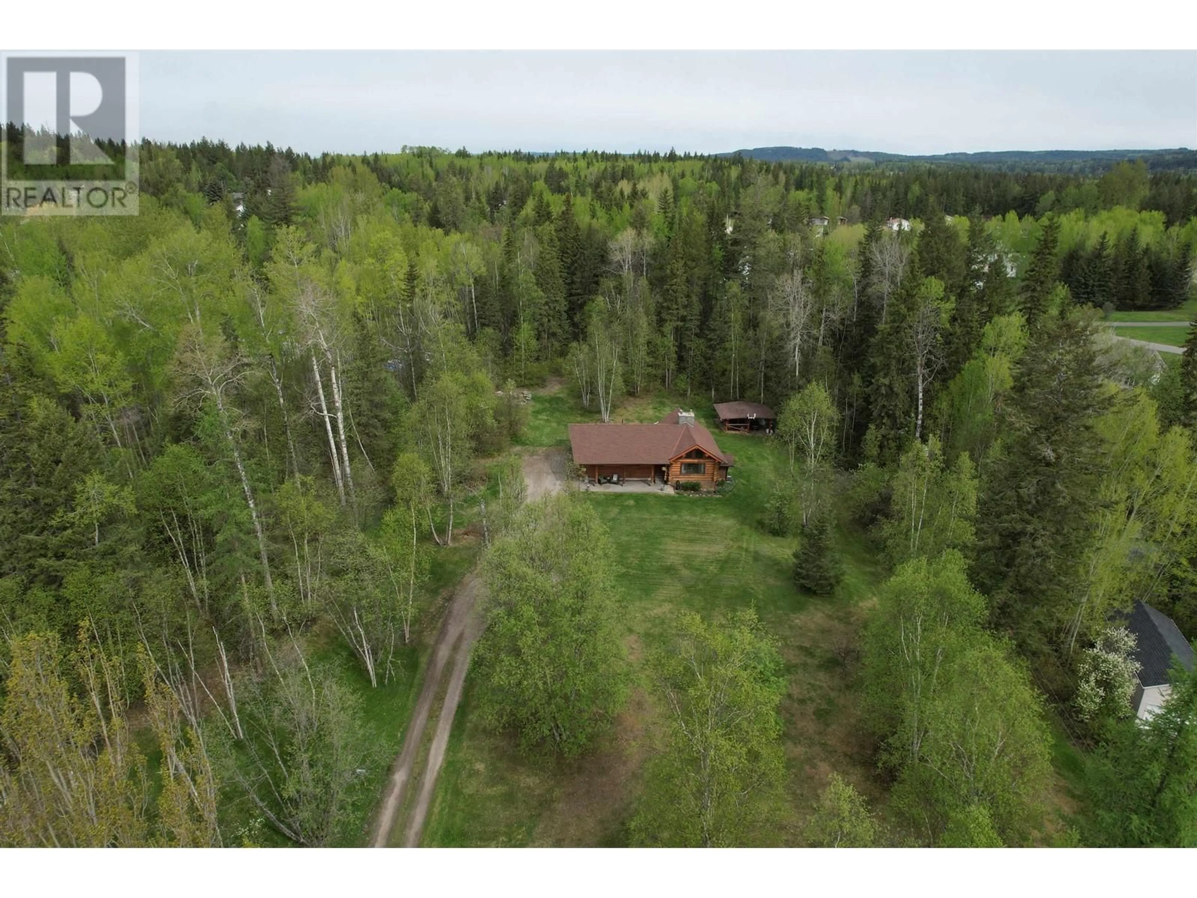 A pic from outside/outdoor area/front of a property/back of a property/a pic from drone, forest/trees view for 3002 GOOK ROAD, Quesnel British Columbia V2J4K8