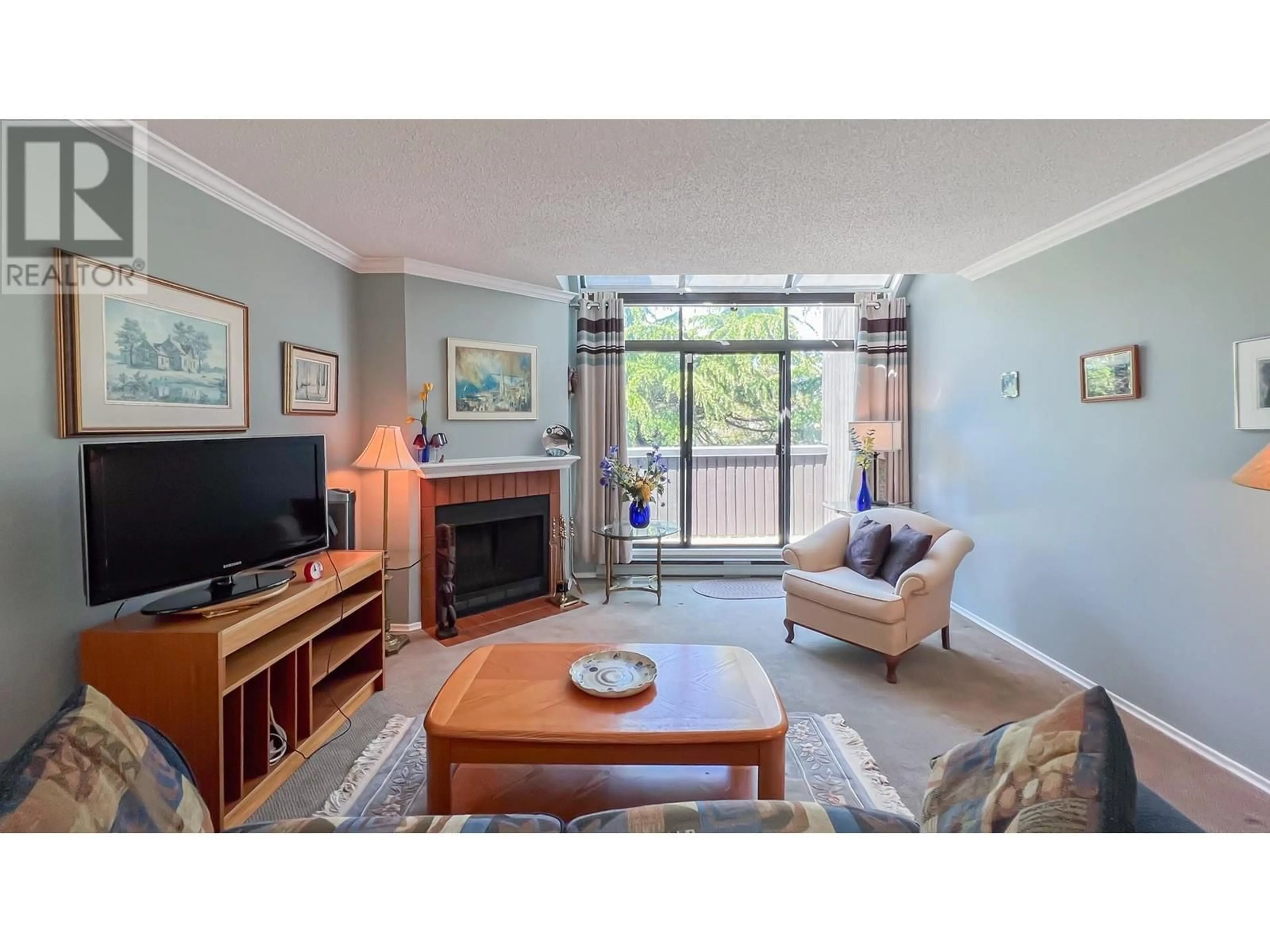 Living room with furniture, unknown for 203 - 7300 MOFFATT ROAD, Richmond British Columbia V6Y1X8