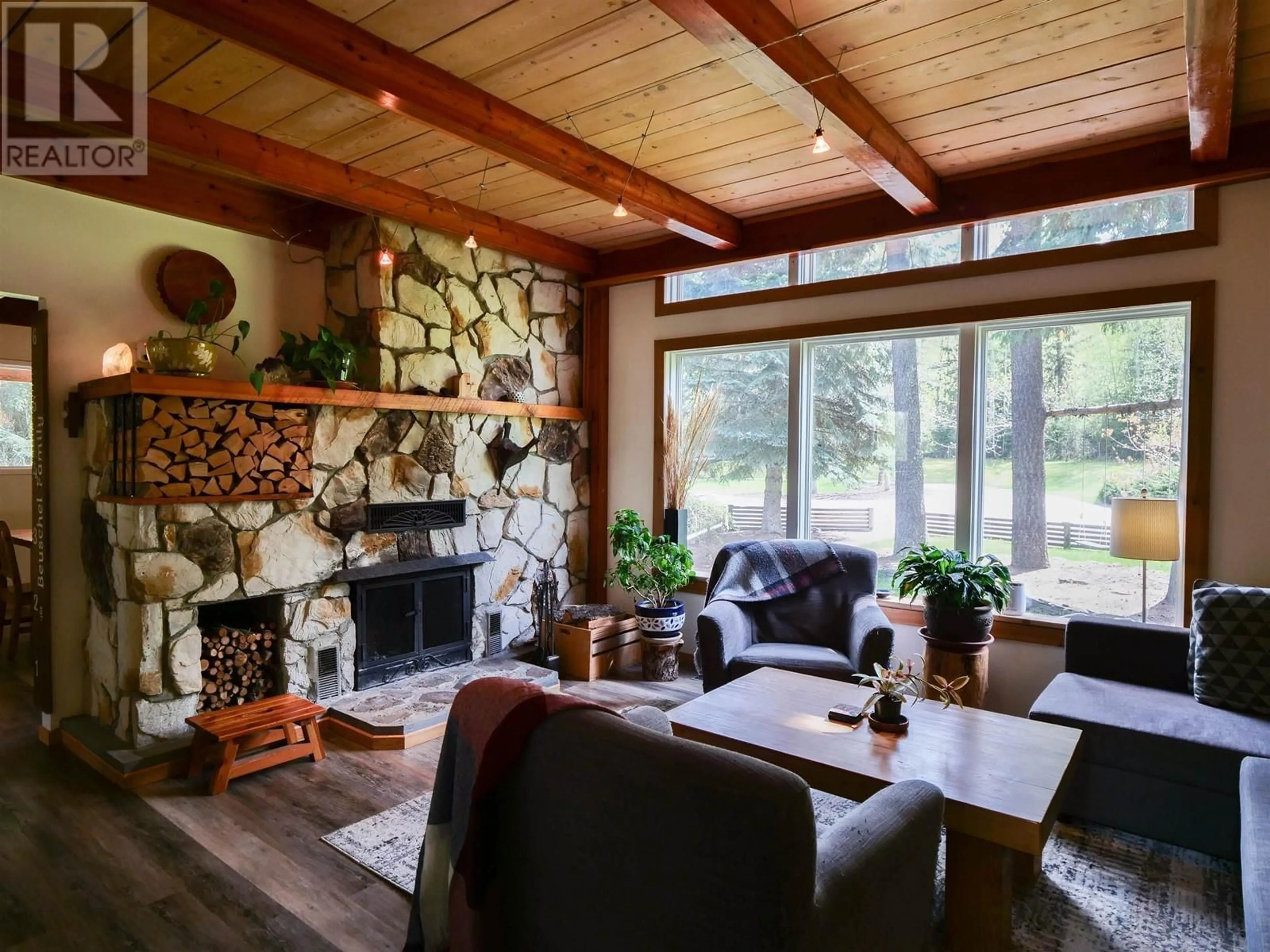 Living room with furniture, wood/laminate floor for 1974 HIGDON ROAD, Quesnel British Columbia V2J6J6