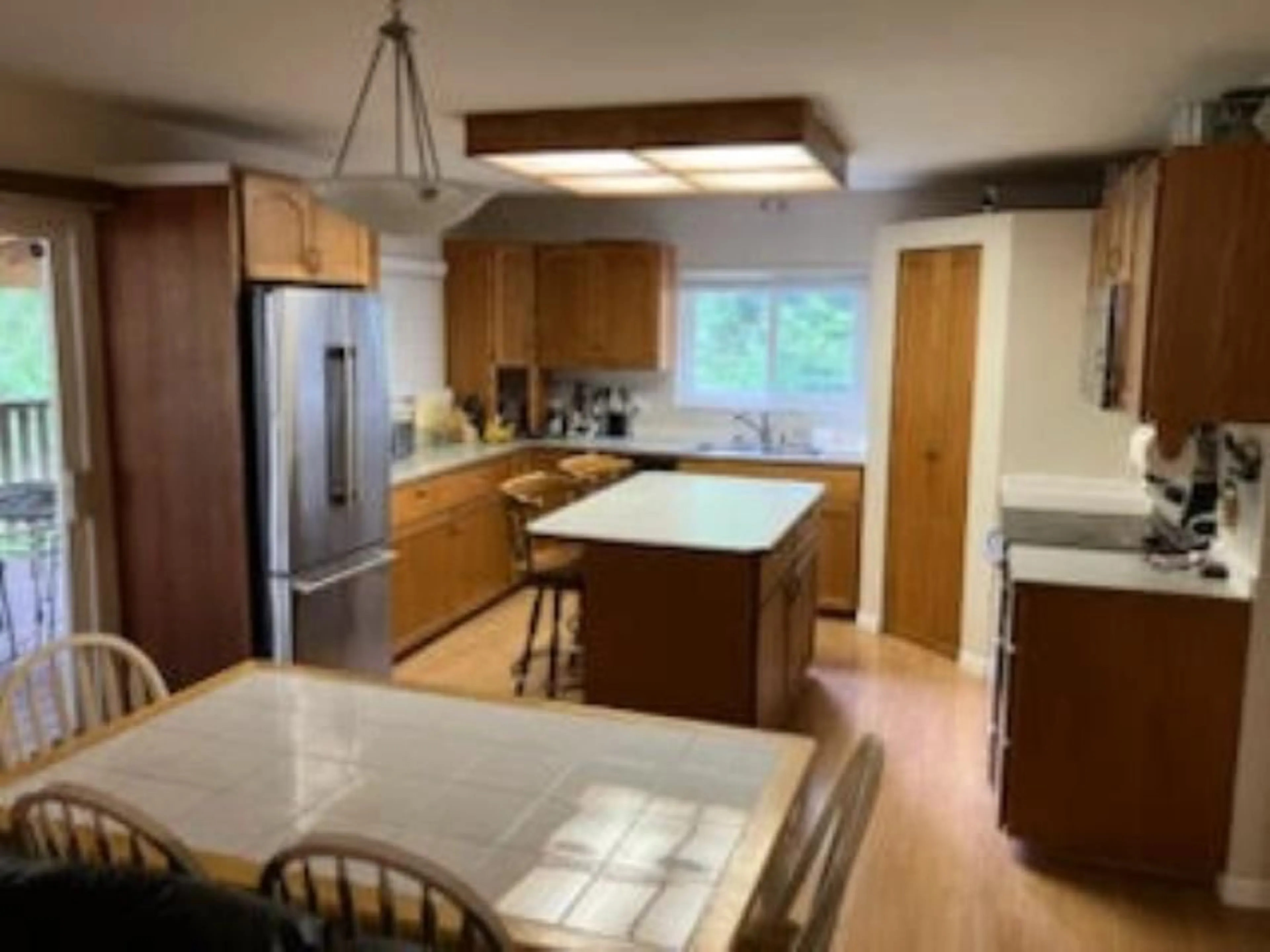 Open concept kitchen, wood/laminate floor for 12483 CARDINAL, Mission British Columbia V4S1L3