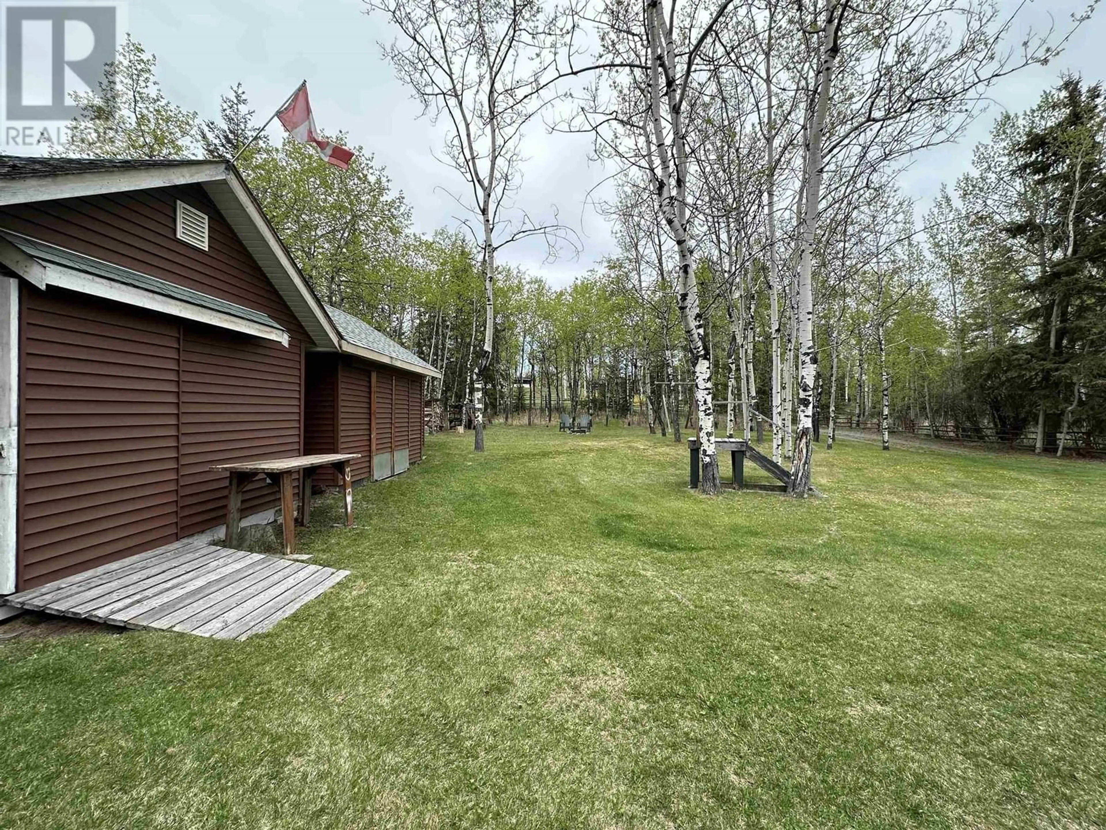 A pic from outside/outdoor area/front of a property/back of a property/a pic from drone, forest/trees view for 5738 GREEN LAKE NORTH ROAD, 70 Mile House British Columbia V0K2K1