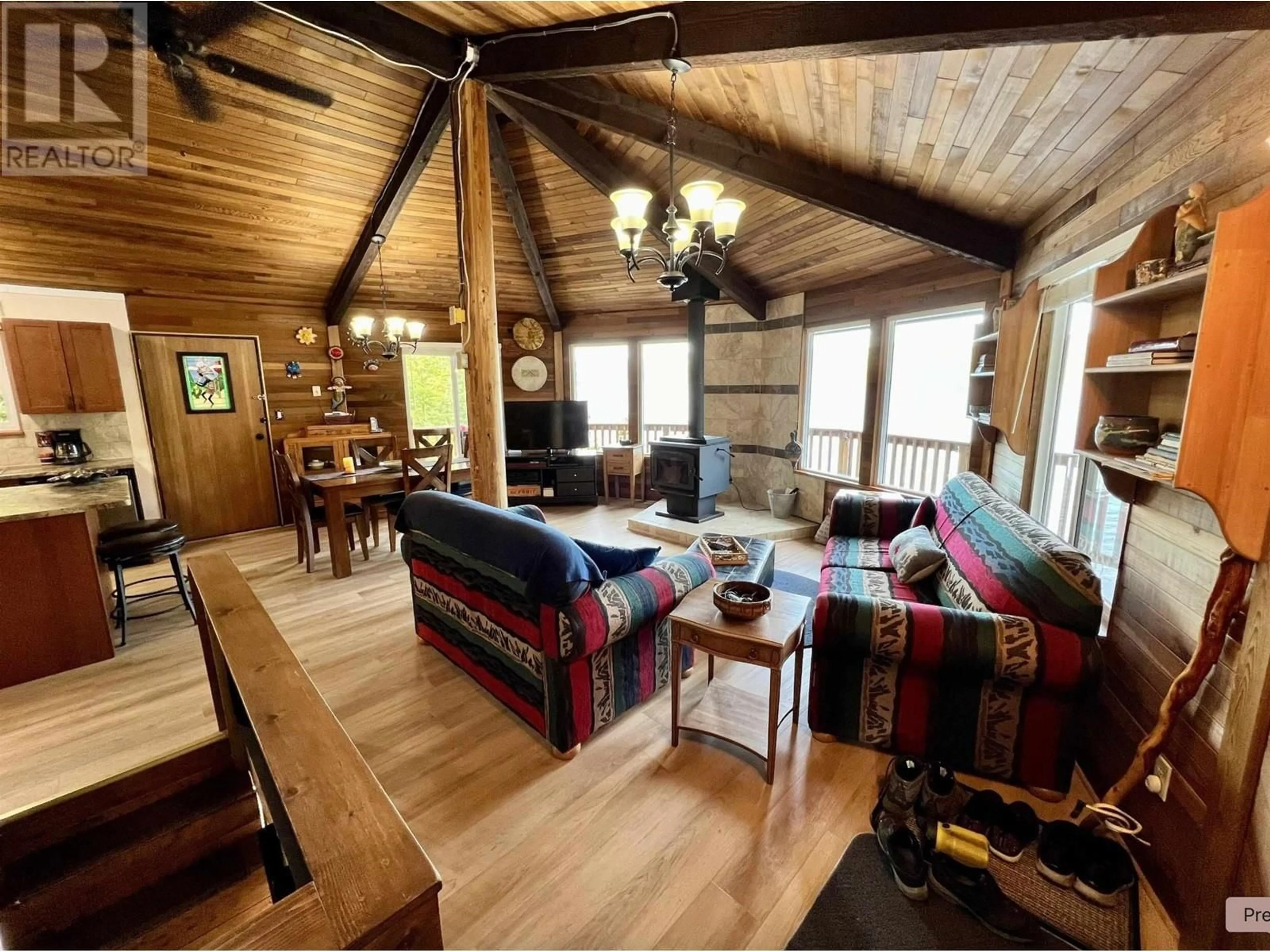 Living room with furniture, wood/laminate floor for 9303 MAHOOD LAKE ROAD, Mahood Lake British Columbia V0K1X3