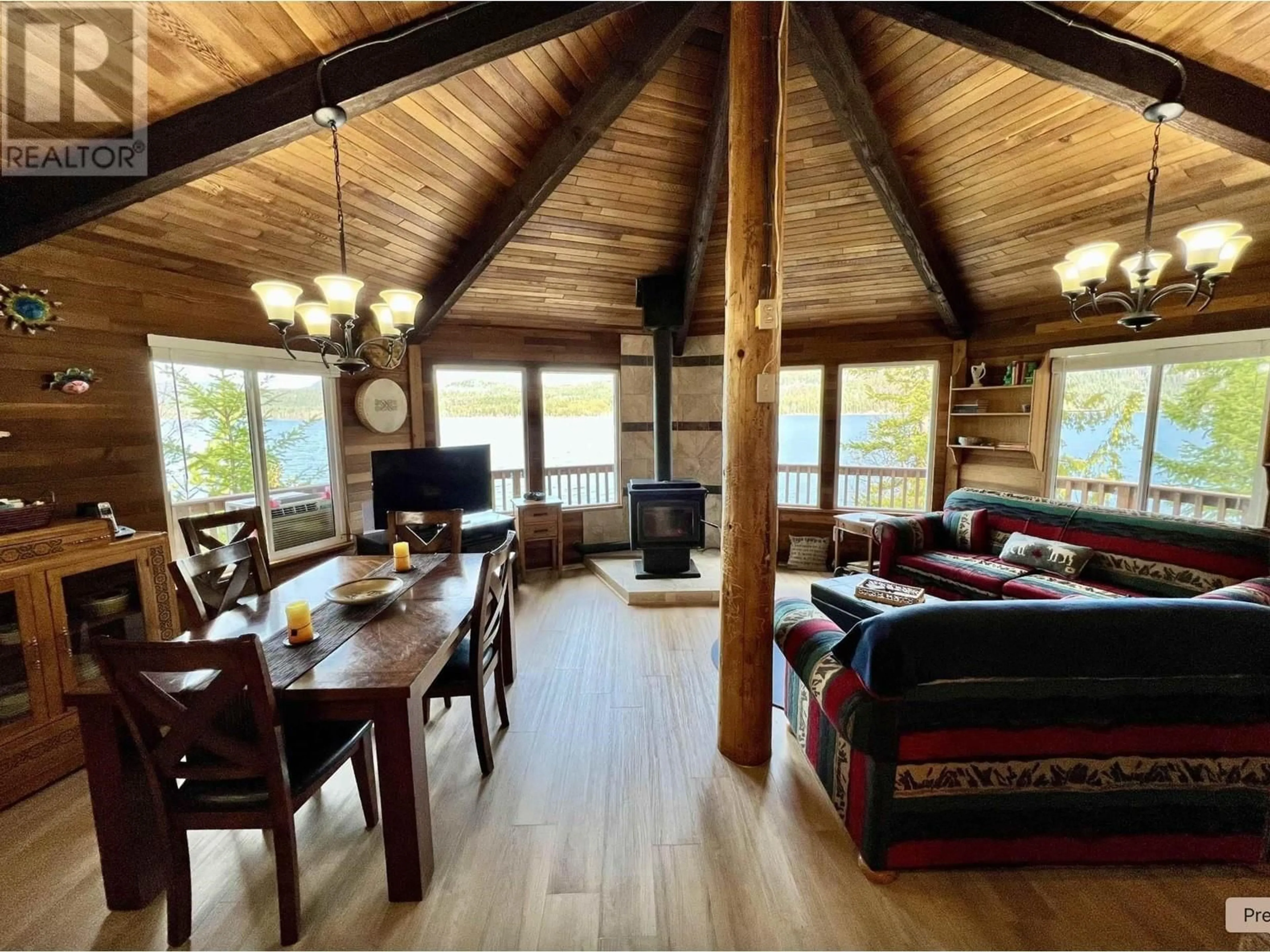 Living room with furniture, wood/laminate floor for 9303 MAHOOD LAKE ROAD, Mahood Lake British Columbia V0K1X3