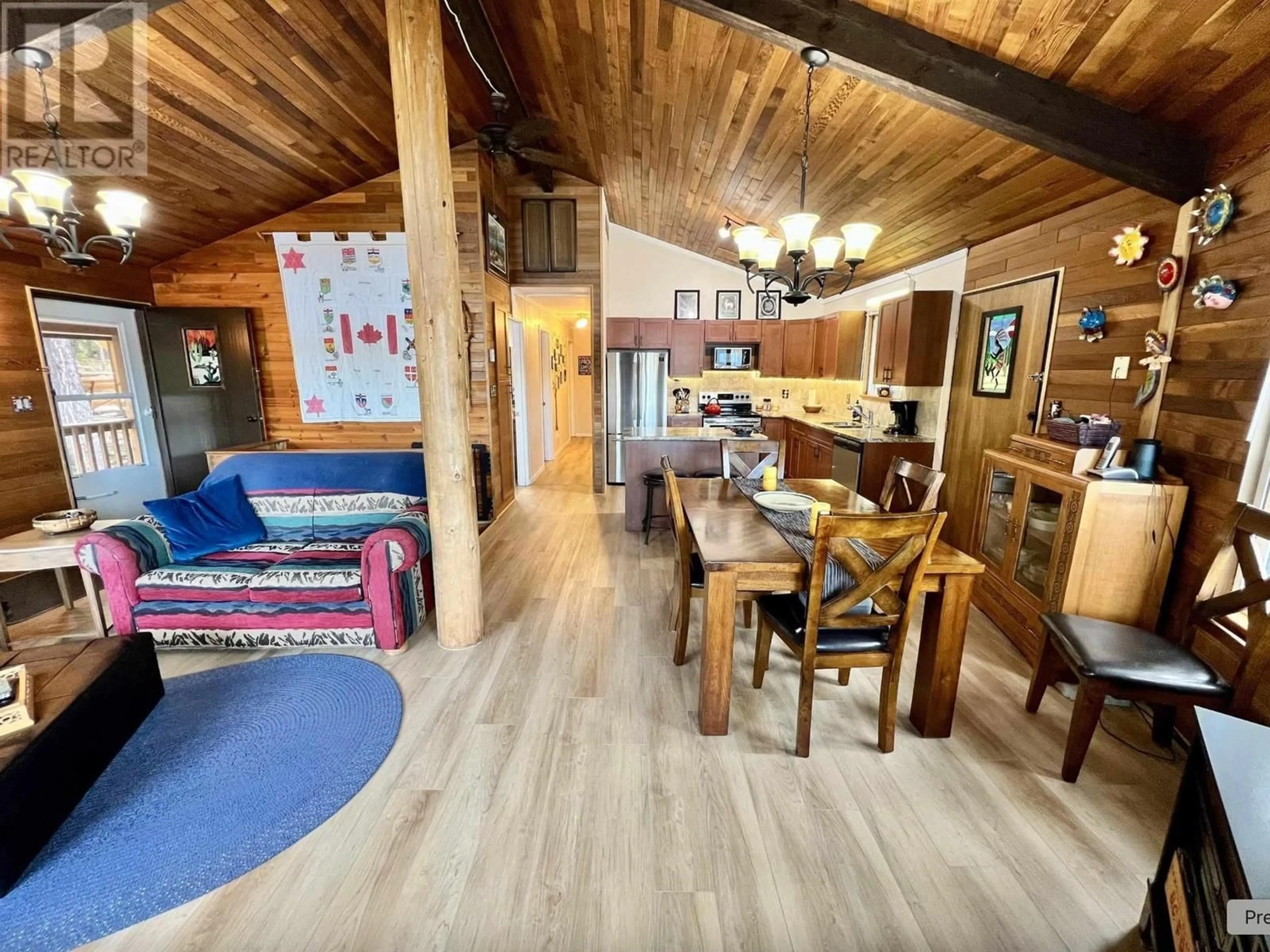 Dining room, wood/laminate floor for 9303 MAHOOD LAKE ROAD, Mahood Lake British Columbia V0K1X3