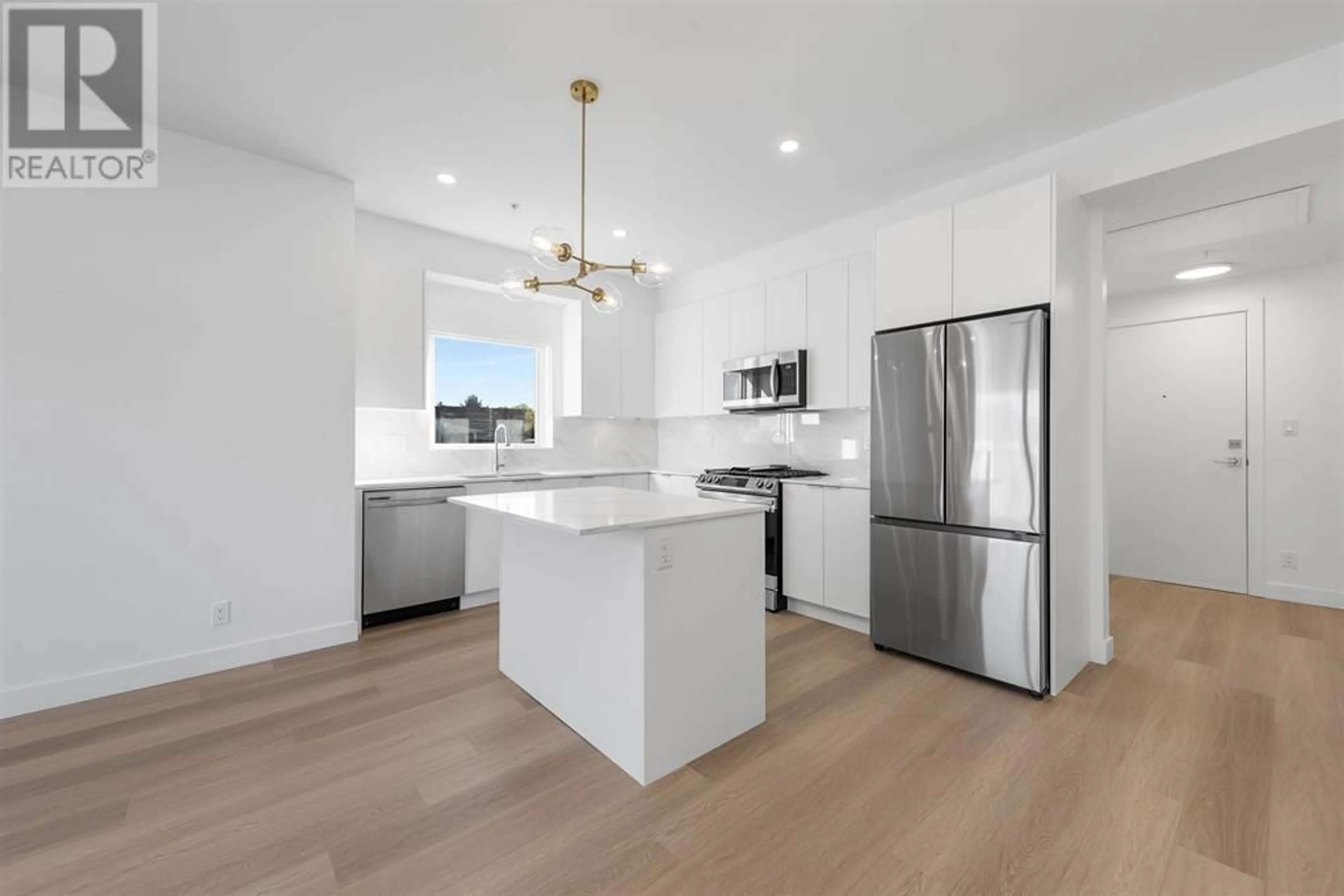 Open concept kitchen, unknown for 401 - 2331 KELLY AVENUE, Port Coquitlam British Columbia V3C1Y3