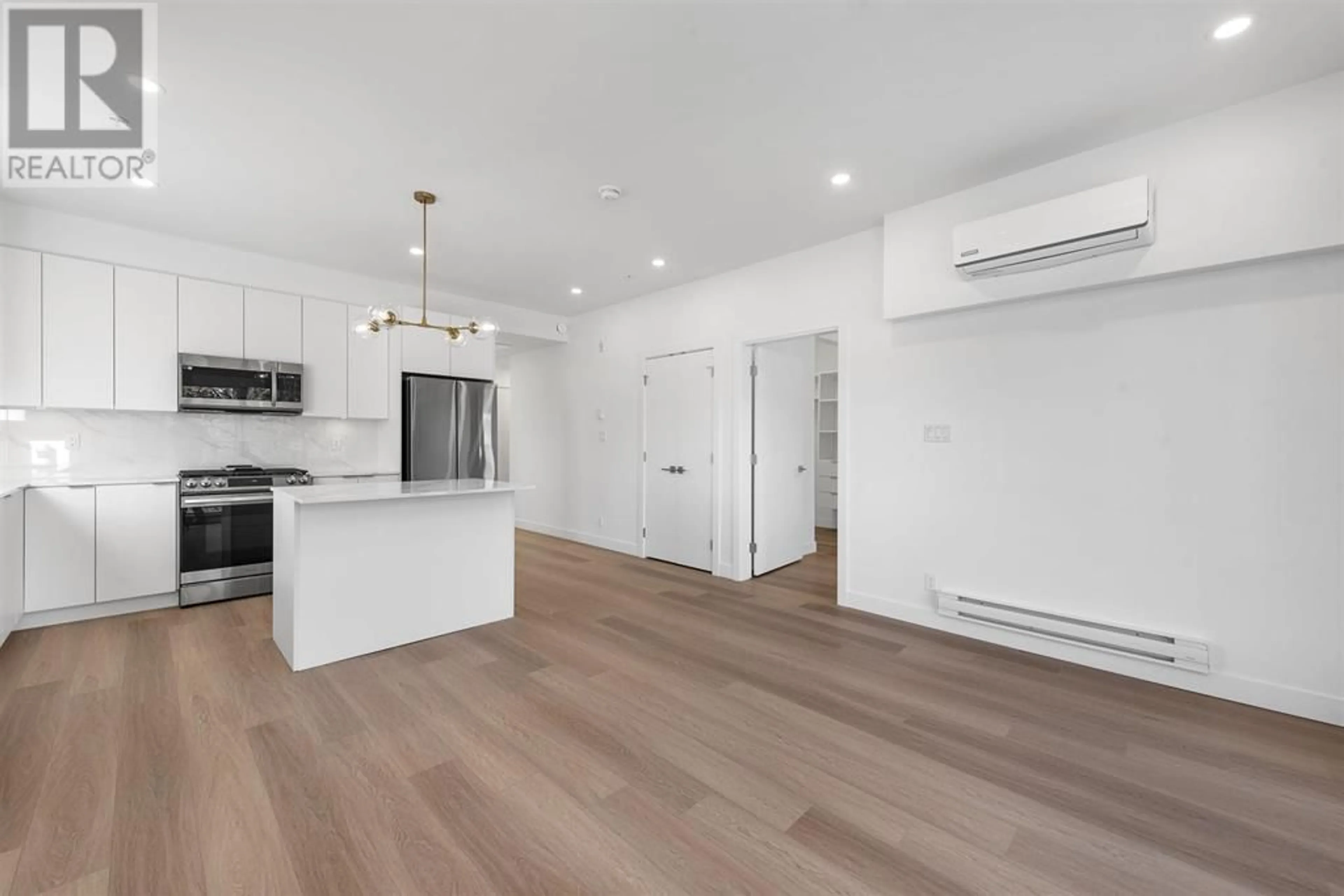 Open concept kitchen, unknown for 401 - 2331 KELLY AVENUE, Port Coquitlam British Columbia V3C1Y3