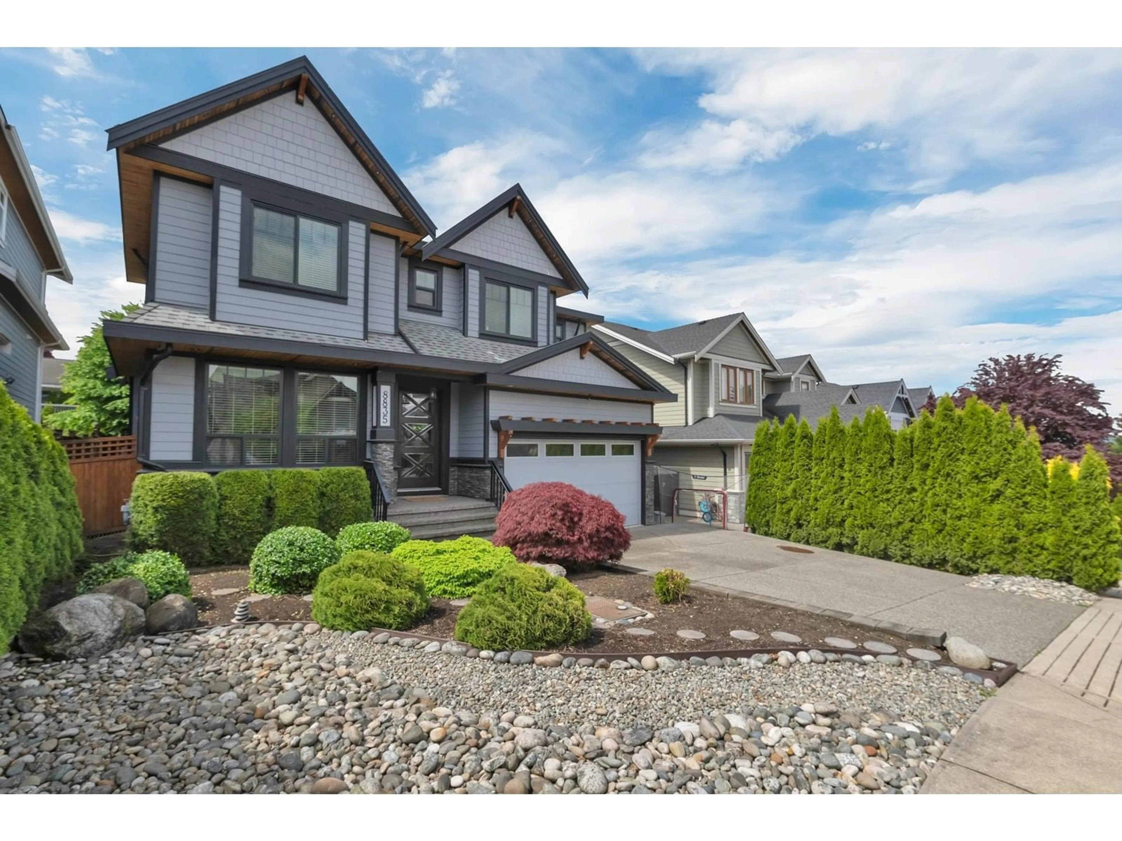 Home with vinyl exterior material, street for 8835 STEGAVIK, Delta British Columbia V4C0C6
