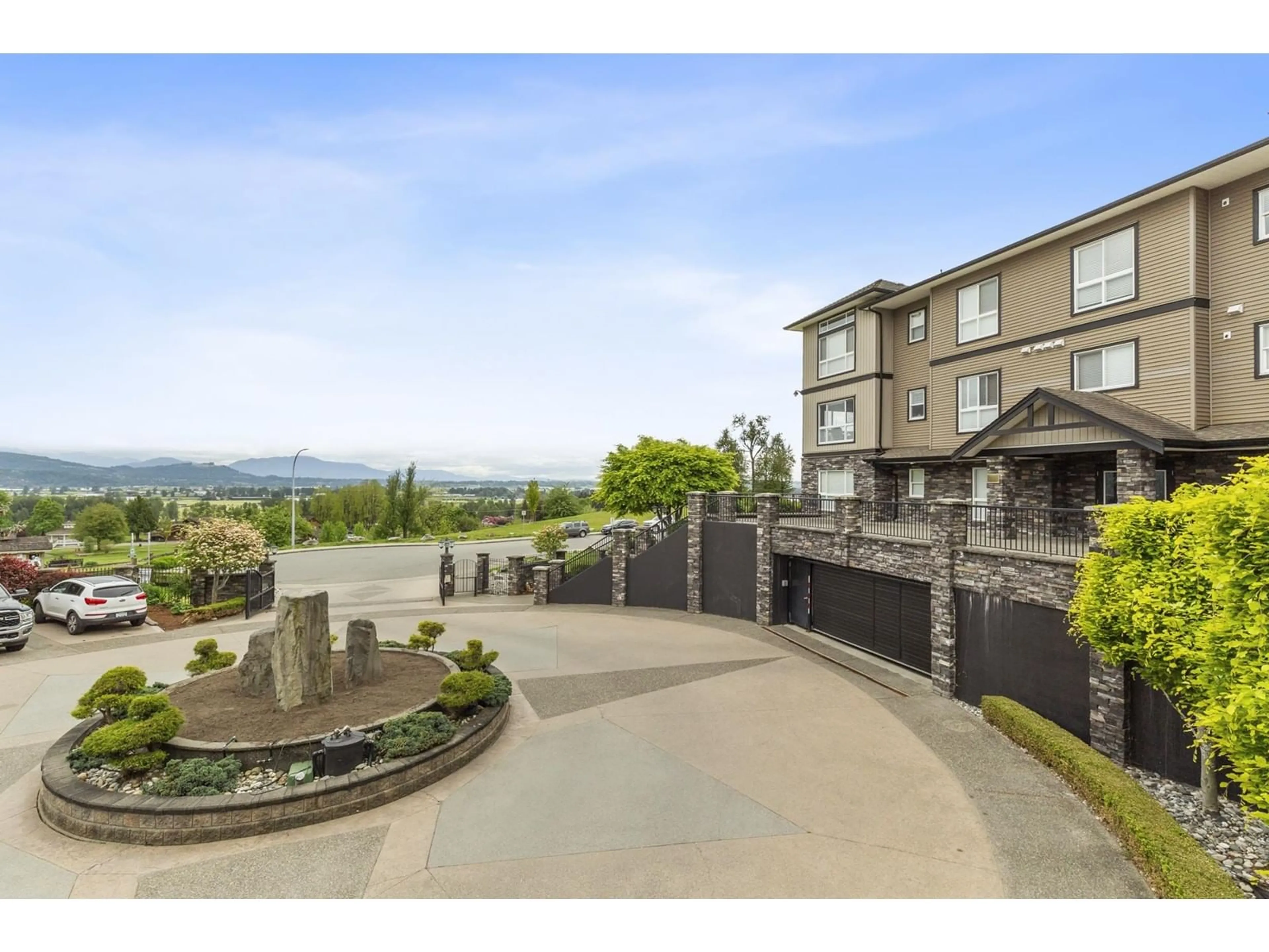 A pic from outside/outdoor area/front of a property/back of a property/a pic from drone, mountain view for A115 - 33755 7TH, Mission British Columbia V2V0A4