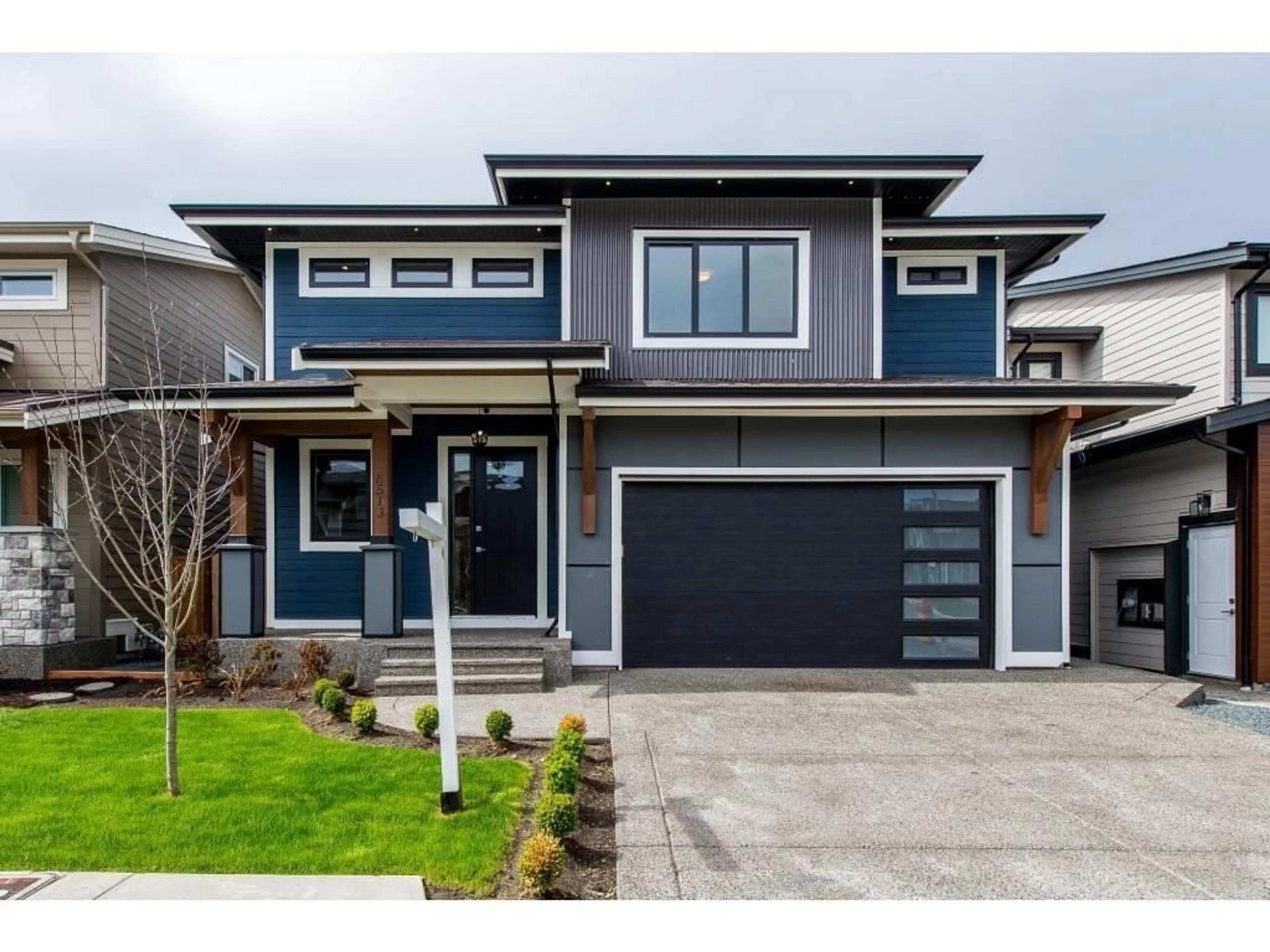 Home with vinyl exterior material, street for 6513 IRON STREET, Chilliwack British Columbia V2R0Z8