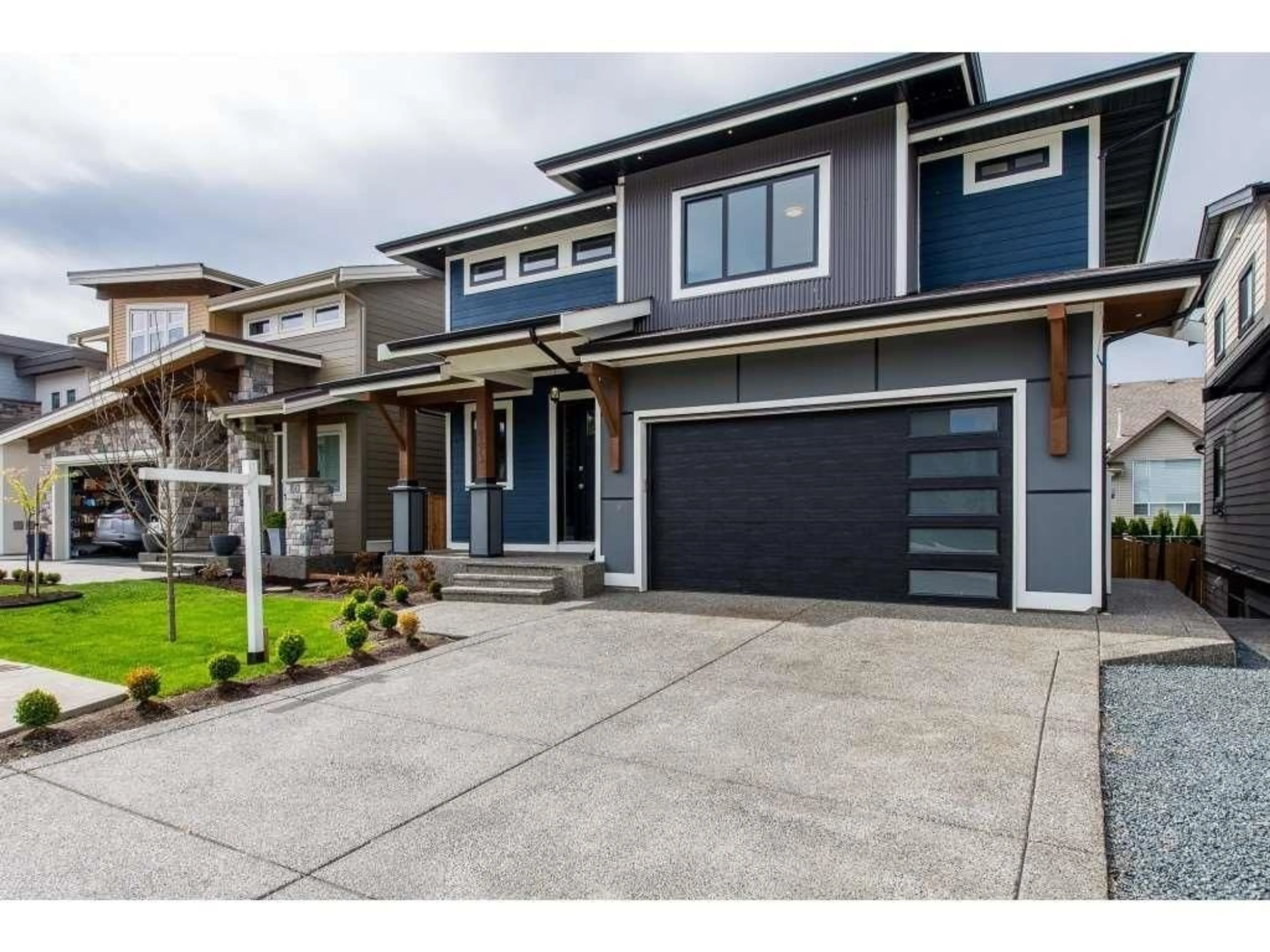 Home with vinyl exterior material, street for 6513 IRON STREET, Chilliwack British Columbia V2R0Z8