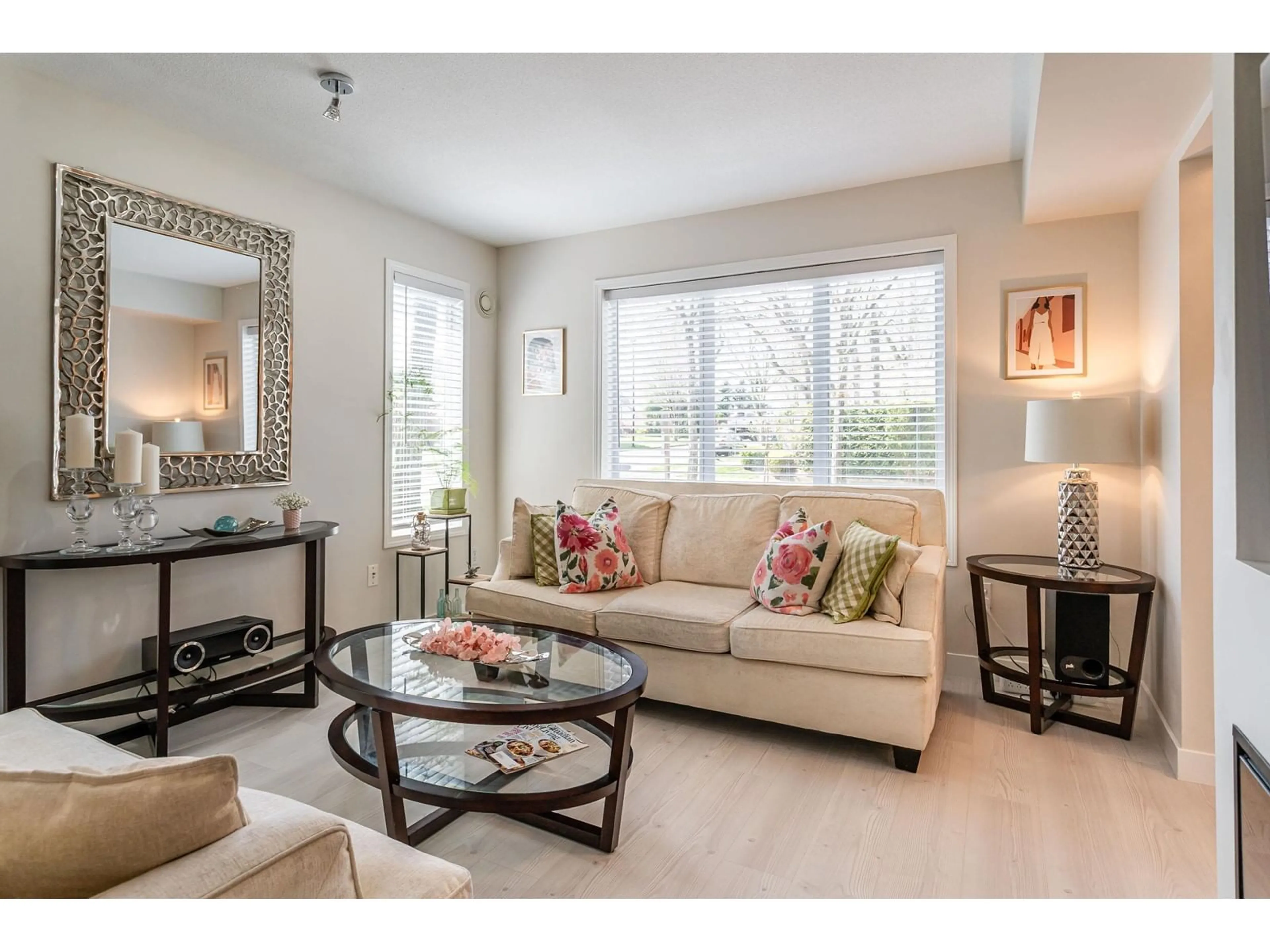 Living room with furniture, wood/laminate floor for 1 - 18883 65, Surrey British Columbia V3S8Y2