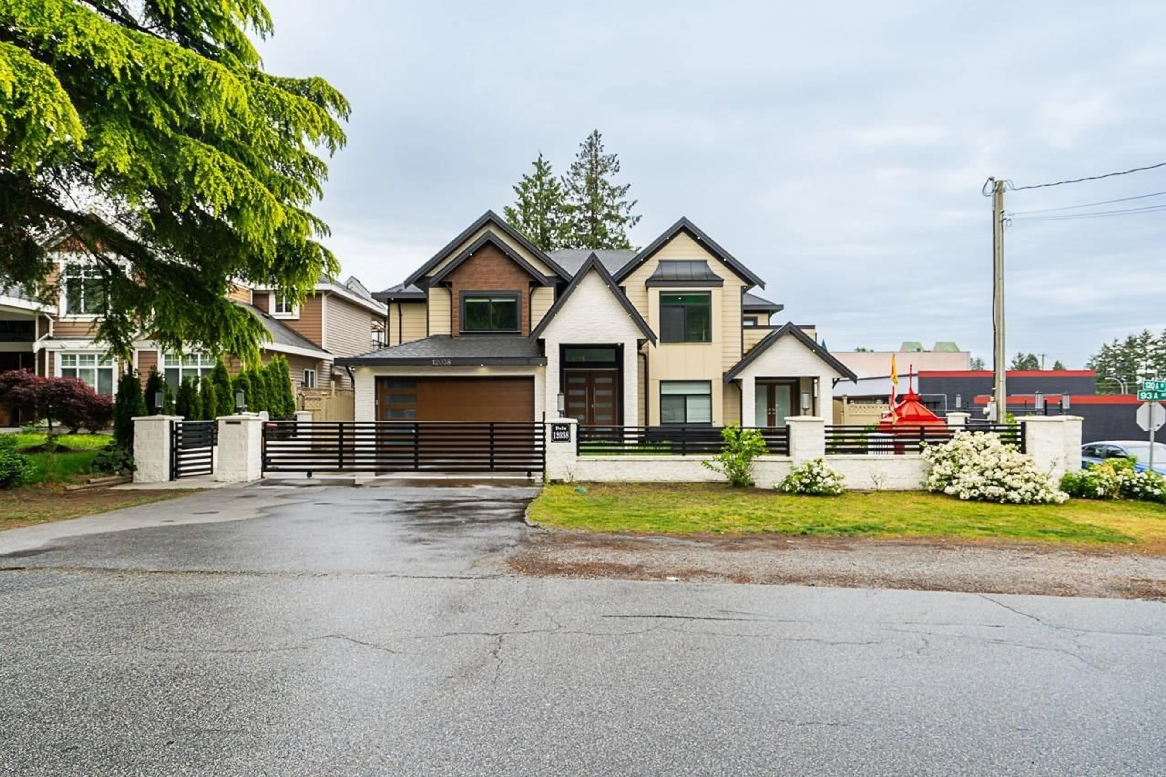 Home with vinyl exterior material, street for 12038 93A, Surrey British Columbia V3V1L1