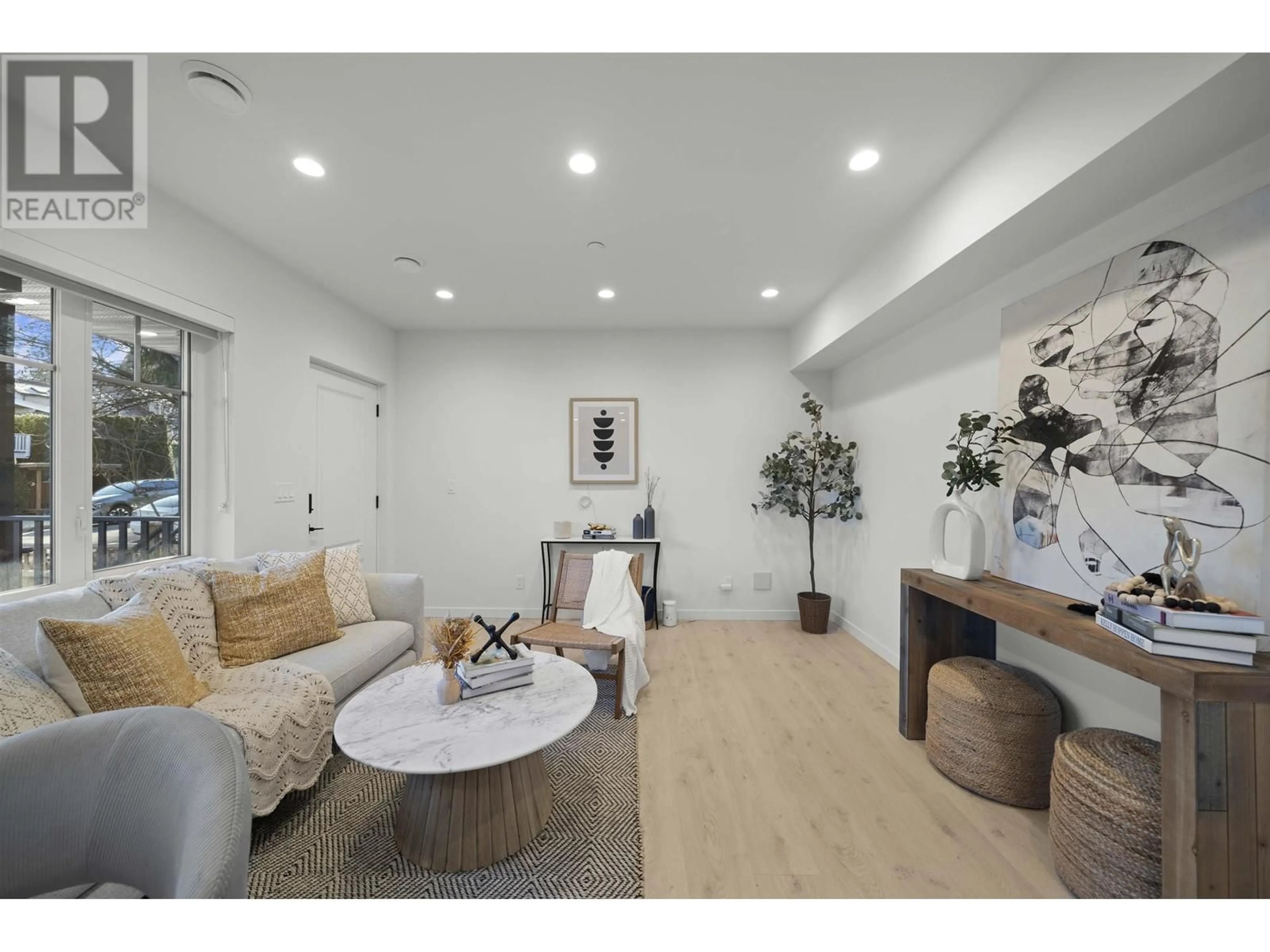 Living room with furniture, wood/laminate floor for 1 - 3531 MARSHALL STREET, Vancouver British Columbia V5N4S2