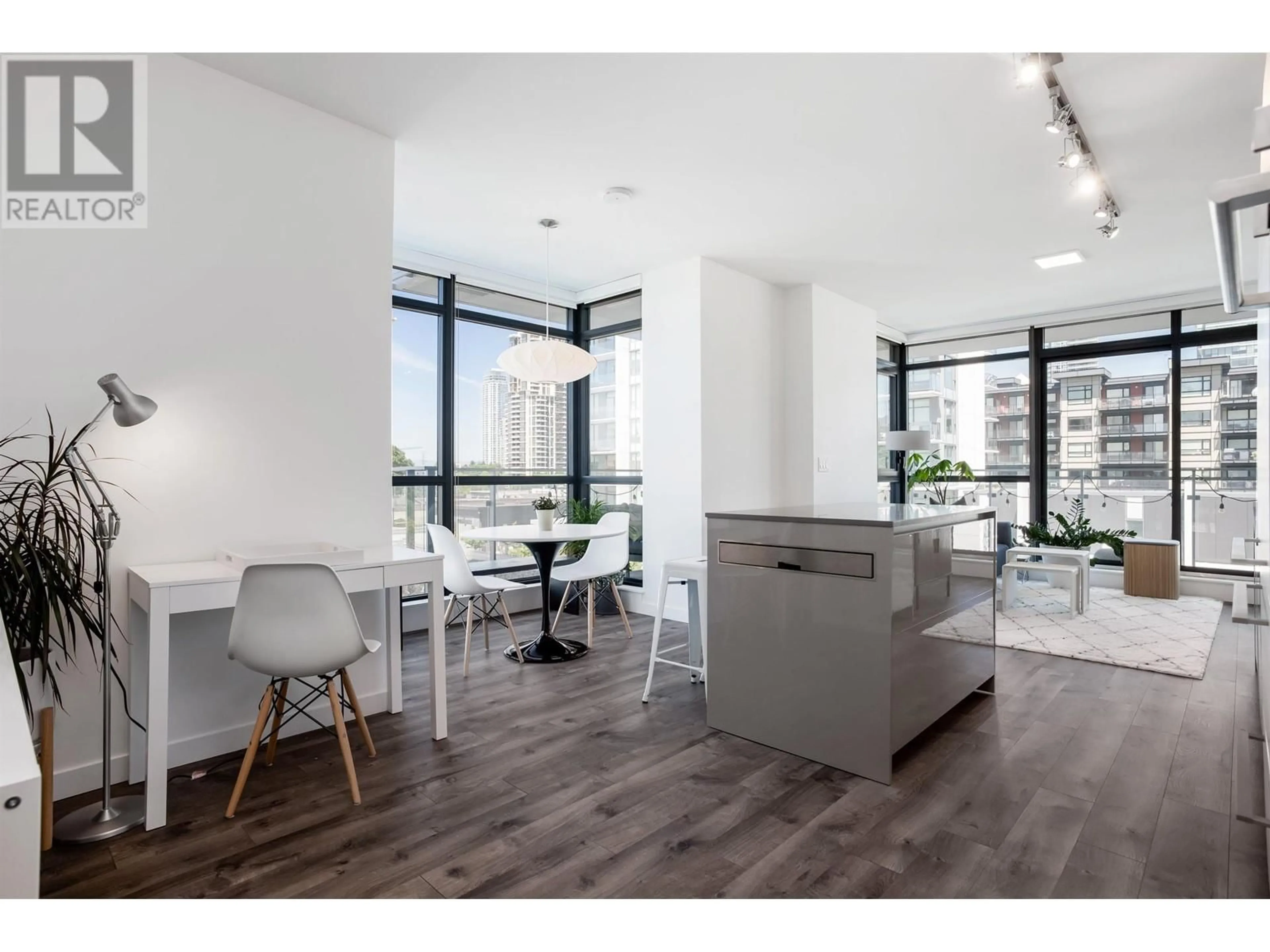 Open concept kitchen, wood/laminate floor for 501 - 4488 JUNEAU STREET, Burnaby British Columbia V5C0M4