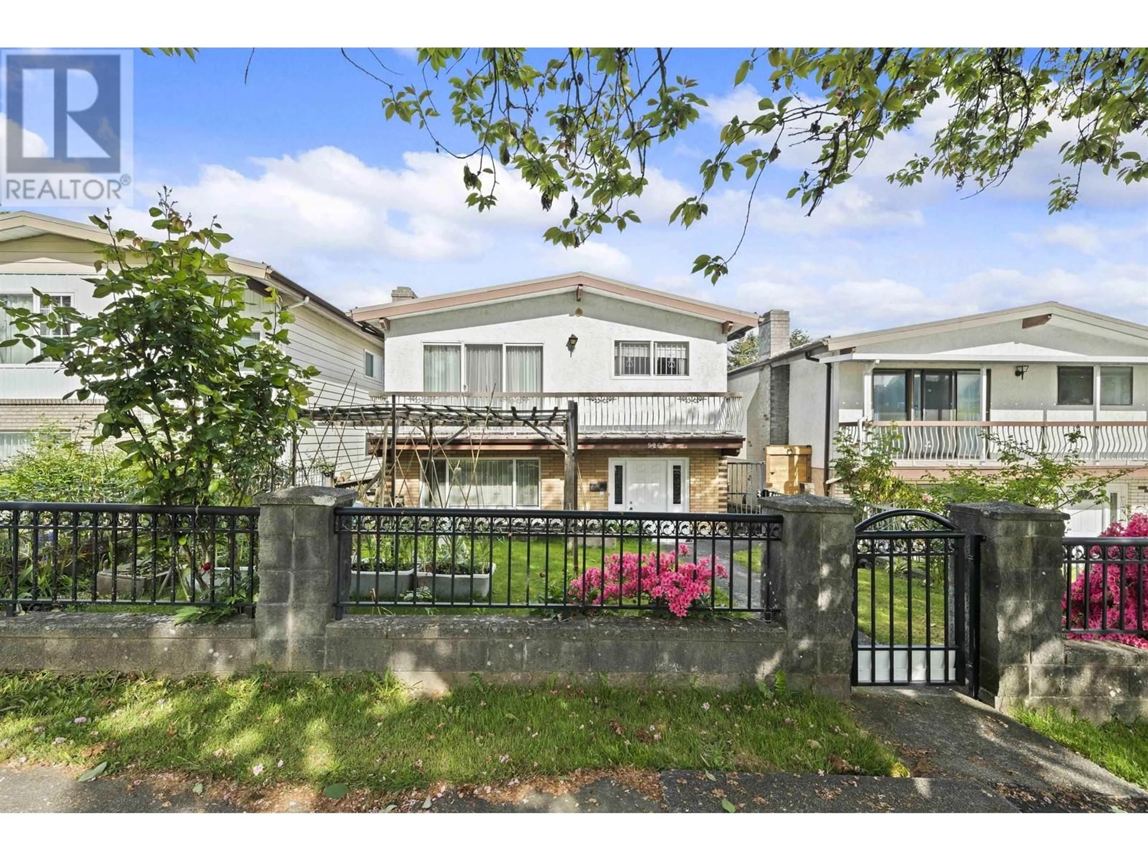 A pic from outside/outdoor area/front of a property/back of a property/a pic from drone, street for 5267 SPENCER STREET, Vancouver British Columbia V5R4A4