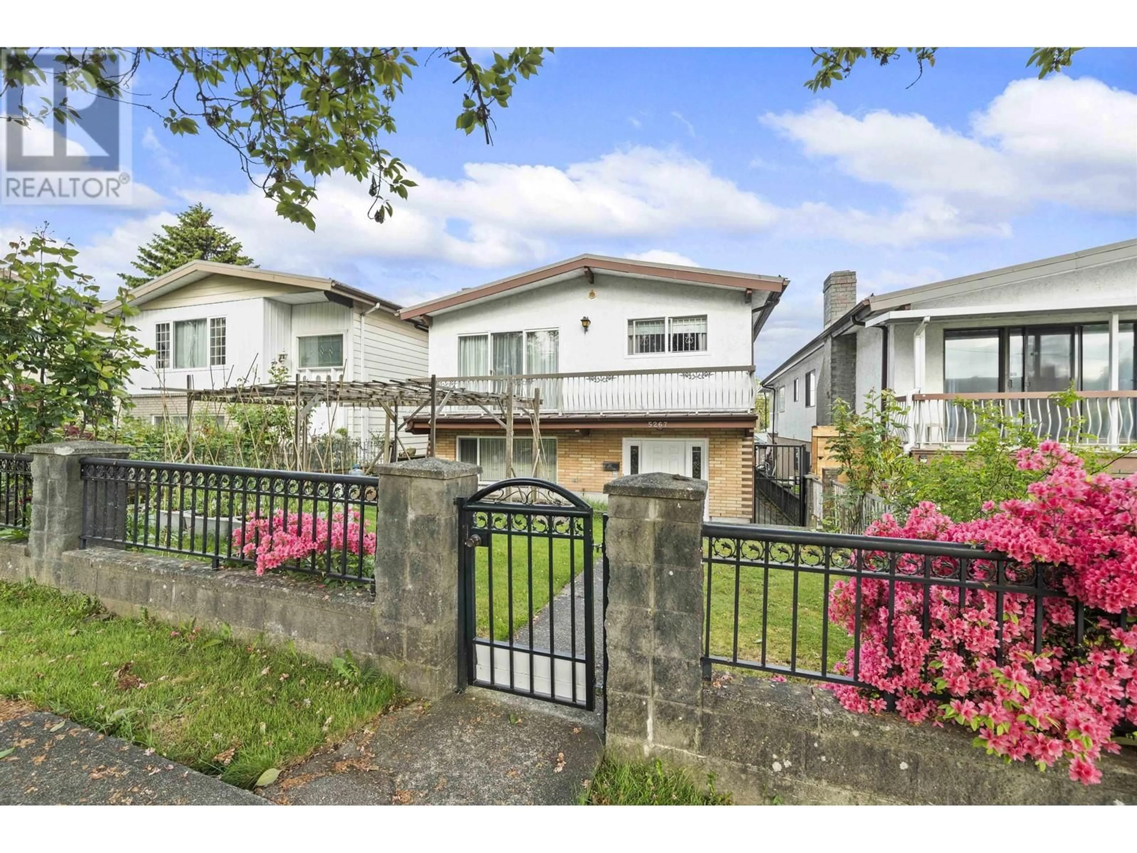 A pic from outside/outdoor area/front of a property/back of a property/a pic from drone, street for 5267 SPENCER STREET, Vancouver British Columbia V5R4A4