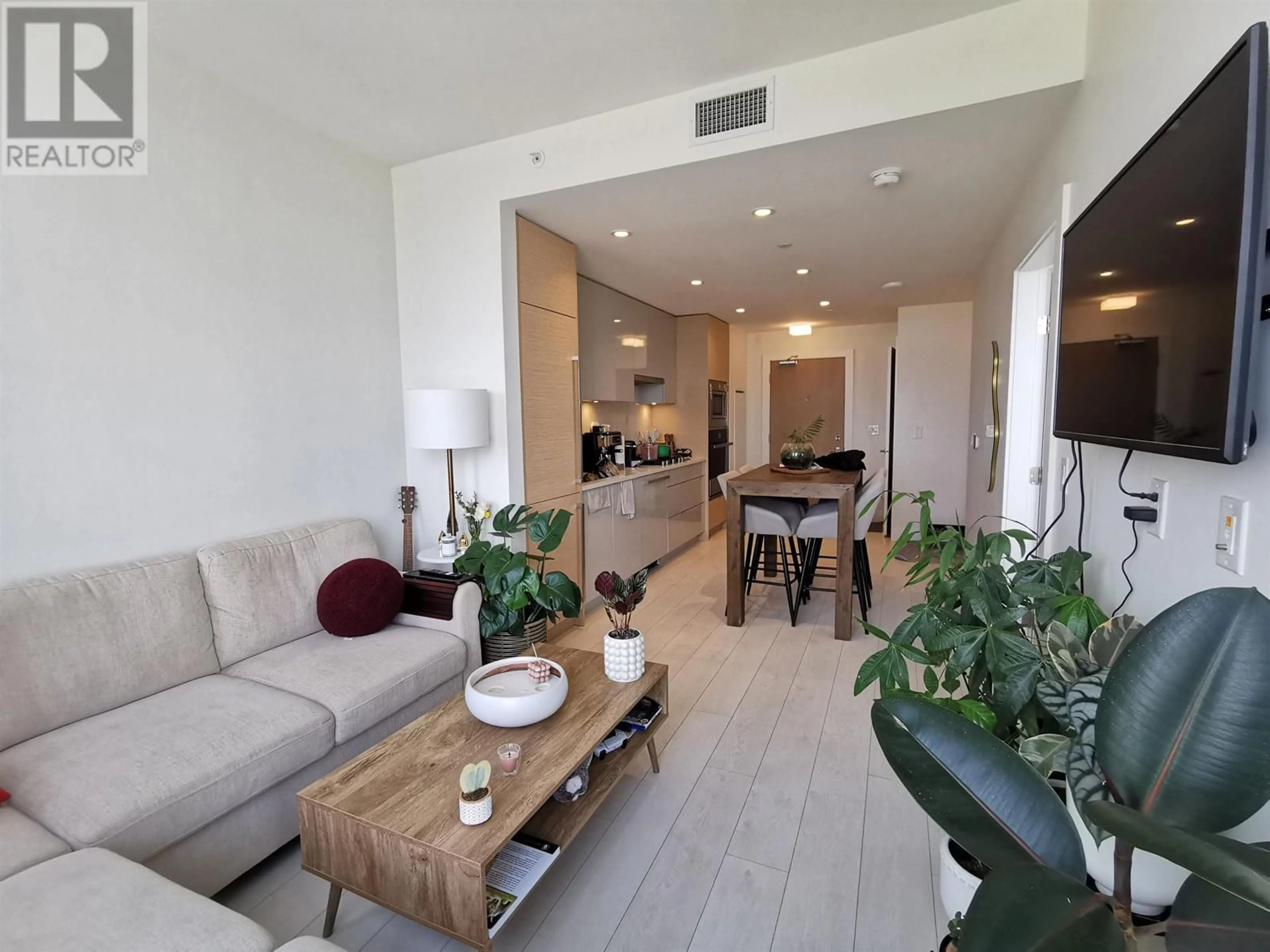 Living room with furniture, unknown for 1001 - 3438 SAWMILL CRESCENT, Vancouver British Columbia V5S0E3