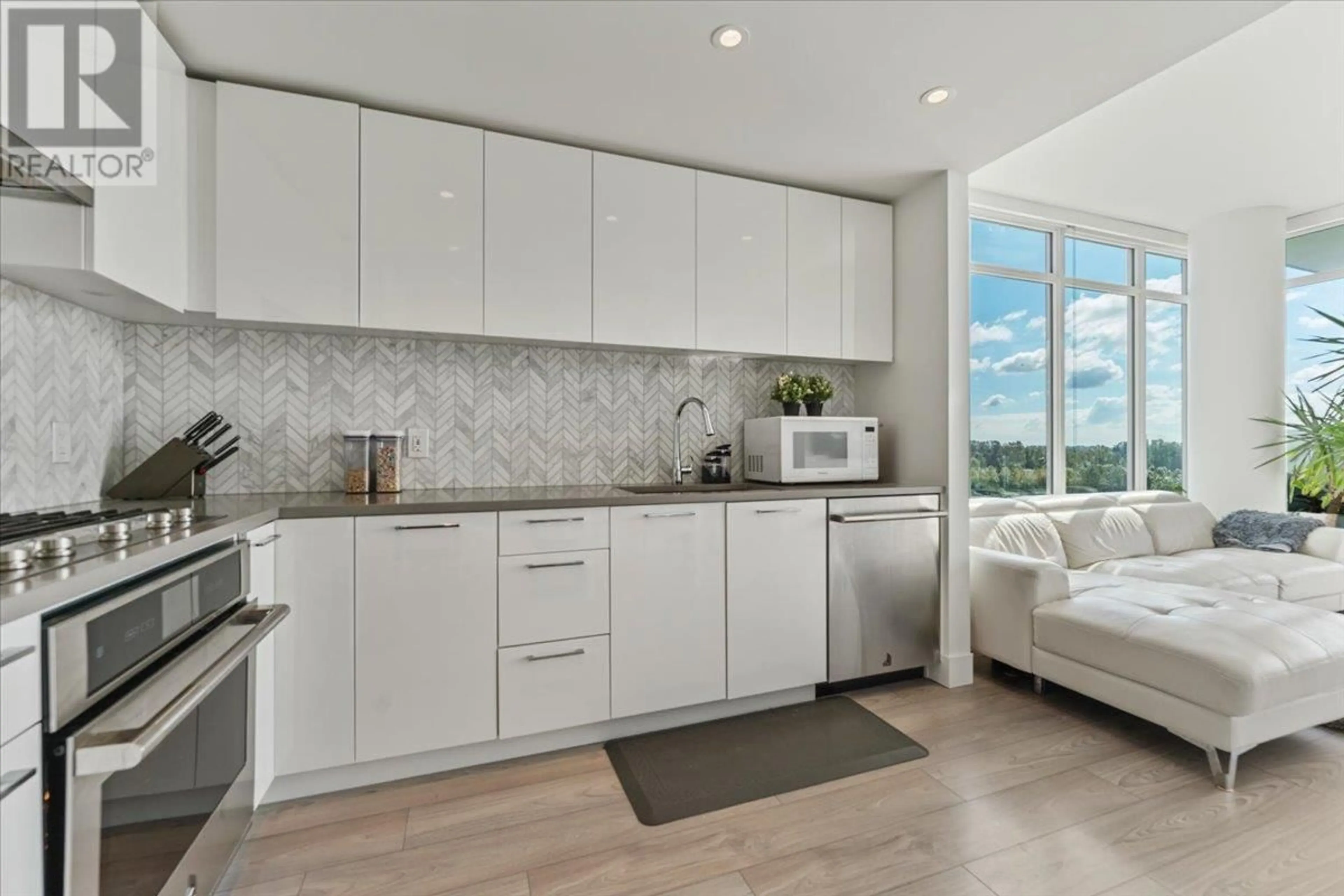 Open concept kitchen, ceramic/tile floor for 901 - 8570 RIVERGRASS DRIVE, Vancouver British Columbia V5S0H4