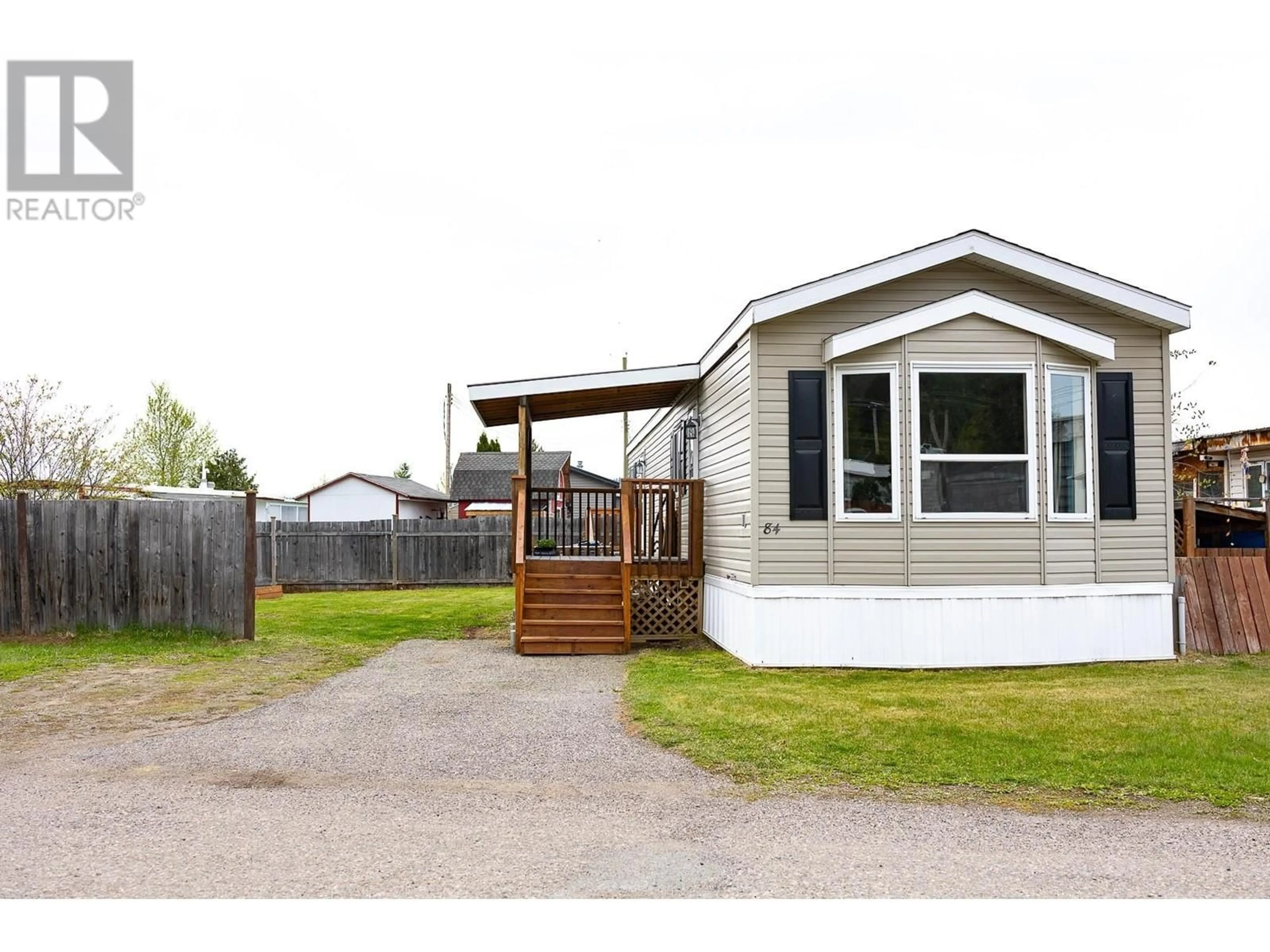 Home with vinyl exterior material, street for 84 - 5125 NORTH NECHAKO ROAD, Prince George British Columbia V2K4V7