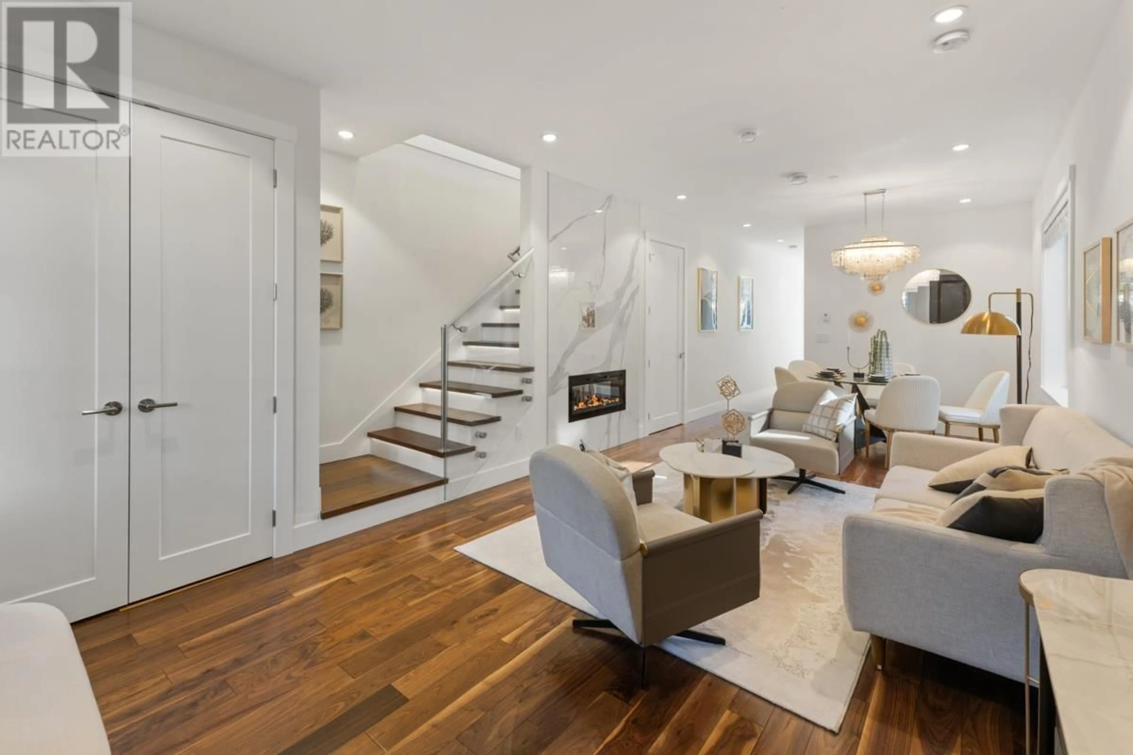 Living room with furniture, wood/laminate floor for 2976 42ND AVENUE, Vancouver British Columbia V6N3G9