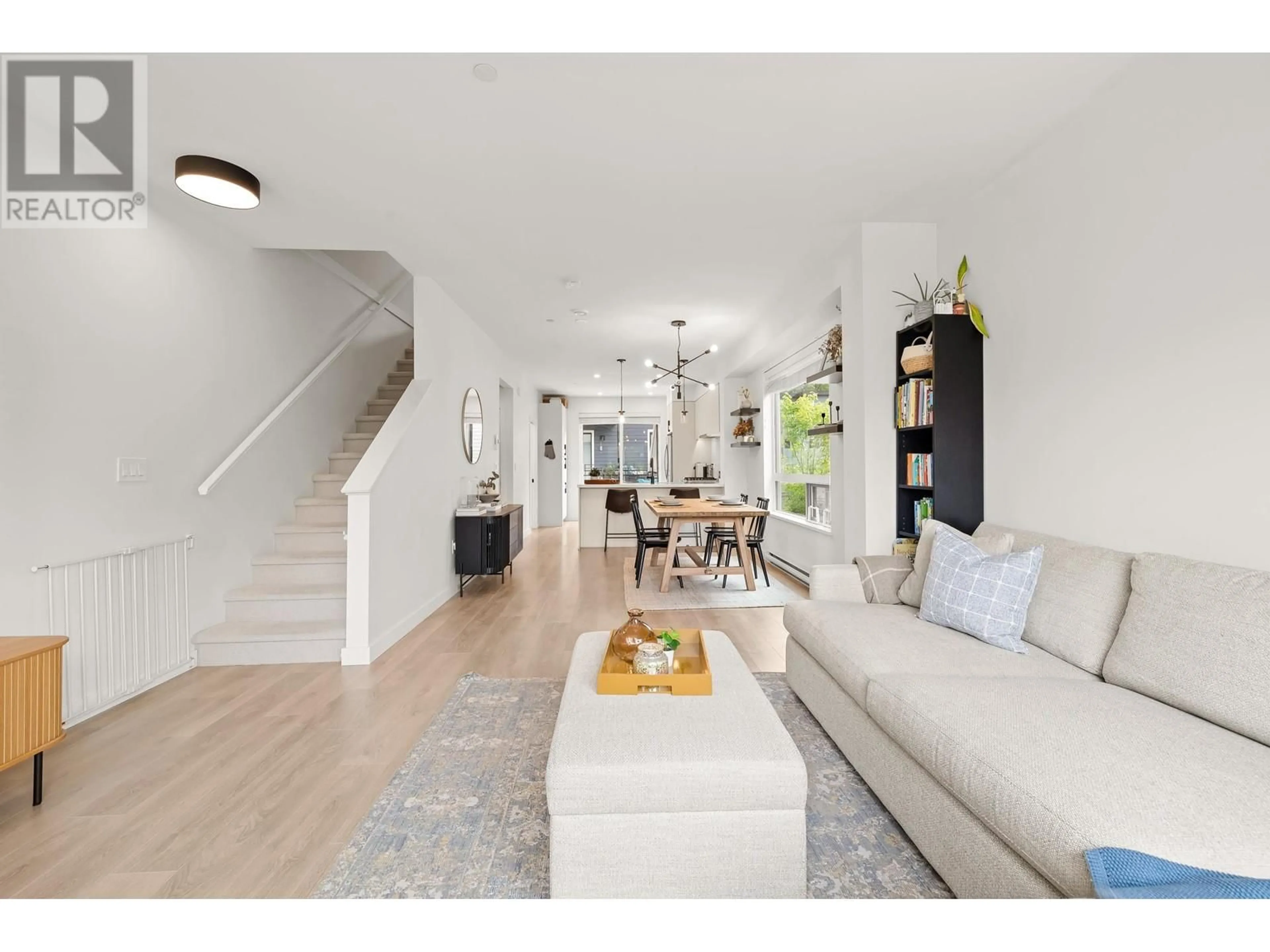 Living room with furniture, unknown for 201 - 3105 ST GEORGE STREET, Port Moody British Columbia V3H2H6