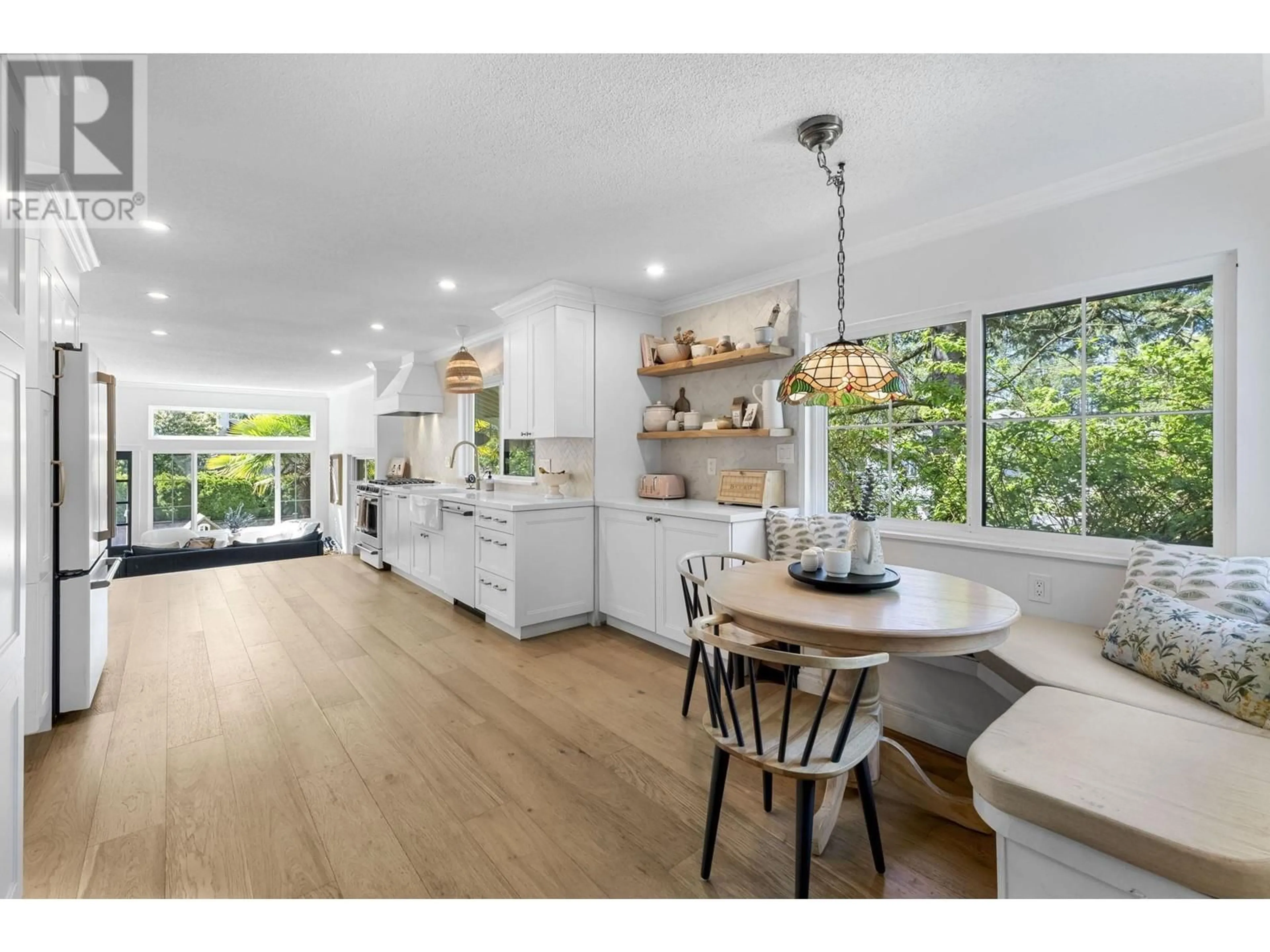 Open concept kitchen, wood/laminate floor for 1682 21ST STREET, North Vancouver British Columbia V7P2E4