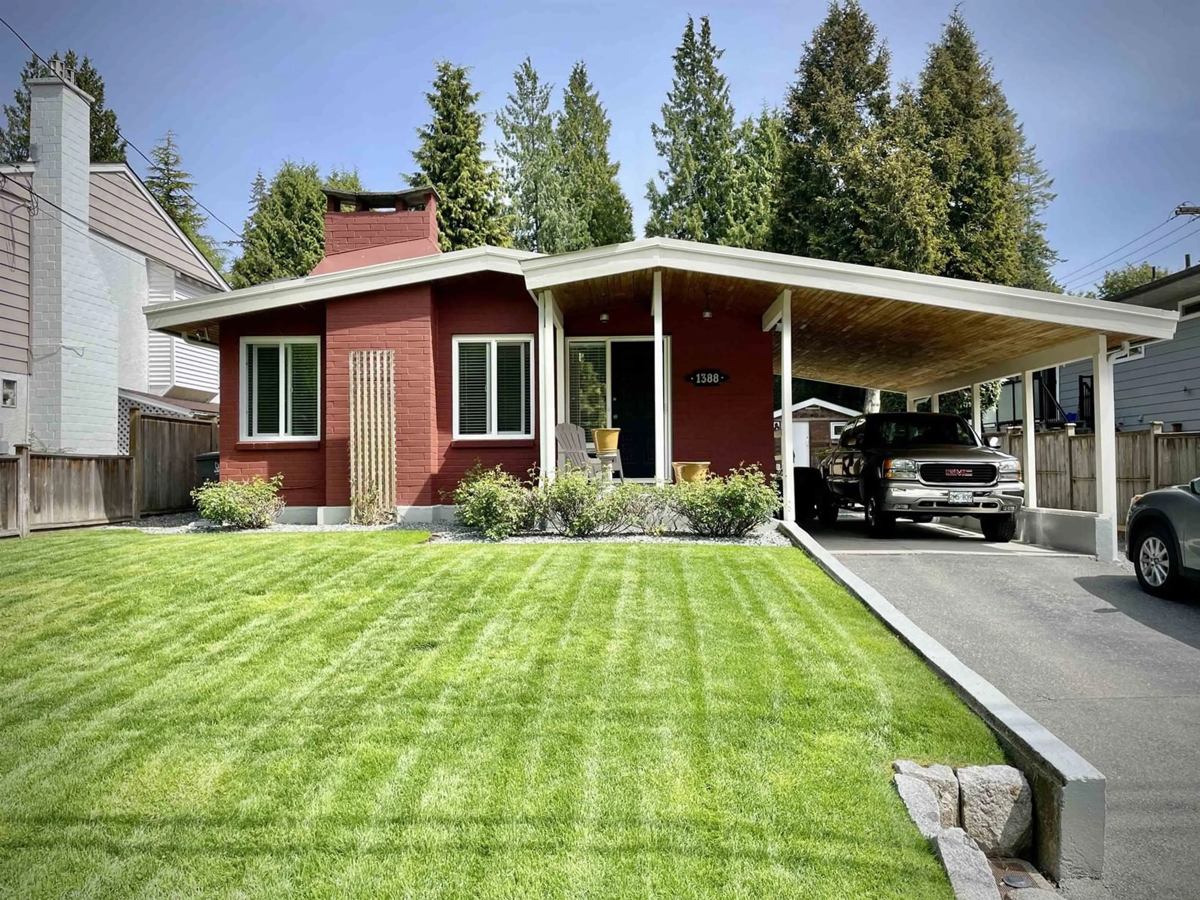 Home with vinyl exterior material, street for 1388 128, Surrey British Columbia V4A3T6