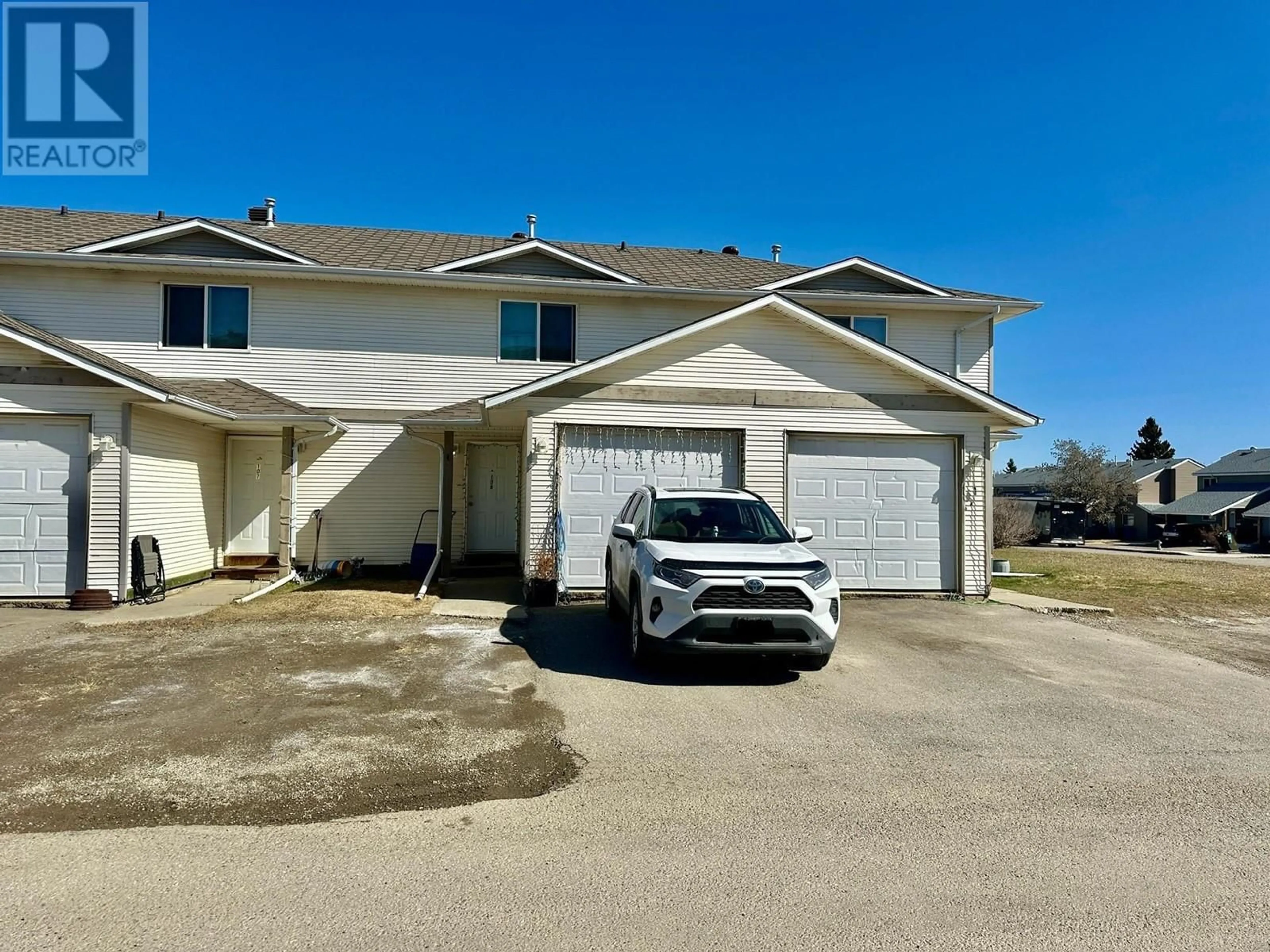 A pic from outside/outdoor area/front of a property/back of a property/a pic from drone, street for 108 - 8328 92 AVENUE, Fort St. John British Columbia V1J6X2