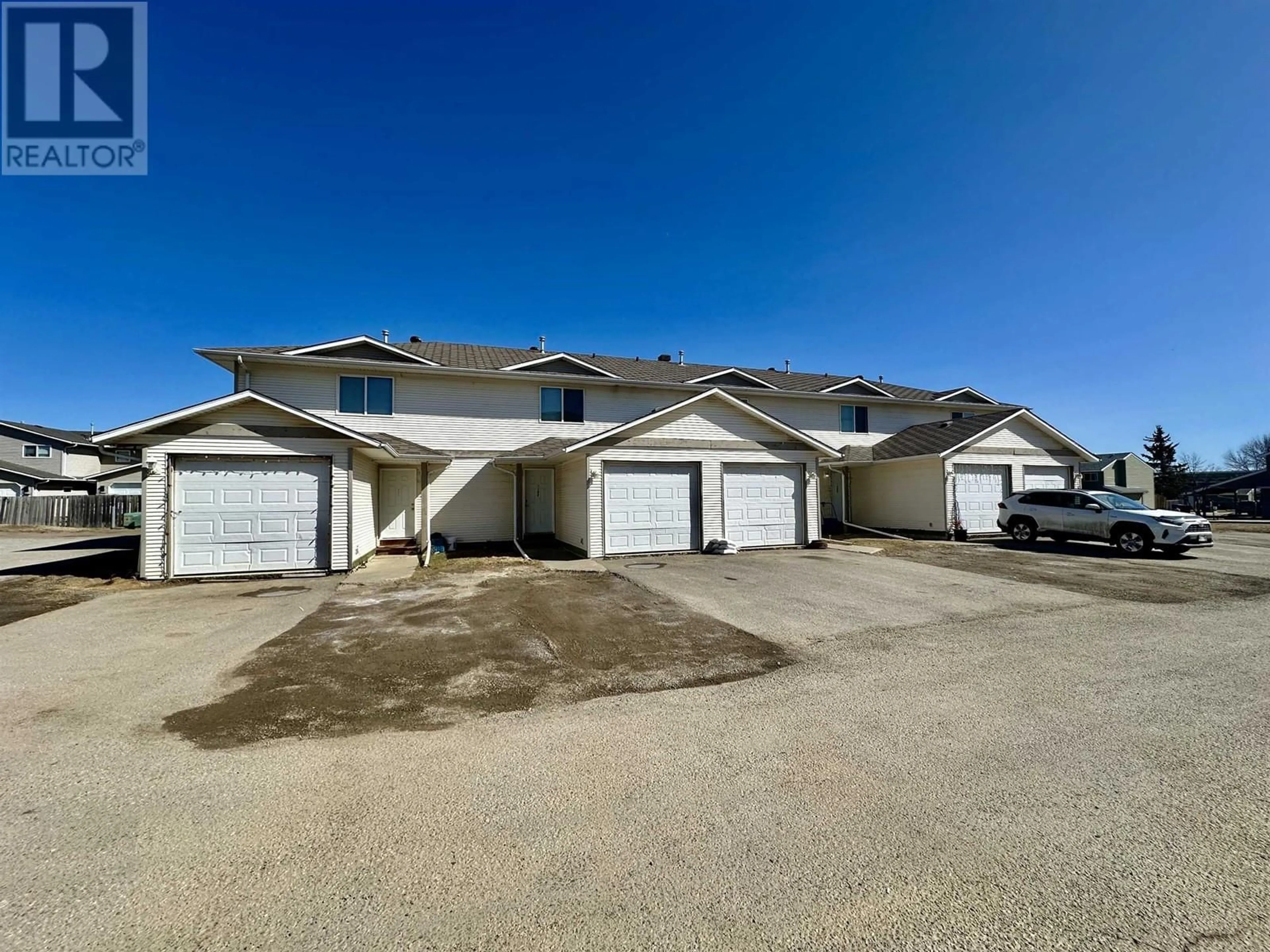 A pic from outside/outdoor area/front of a property/back of a property/a pic from drone, street for 108 - 8328 92 AVENUE, Fort St. John British Columbia V1J6X2