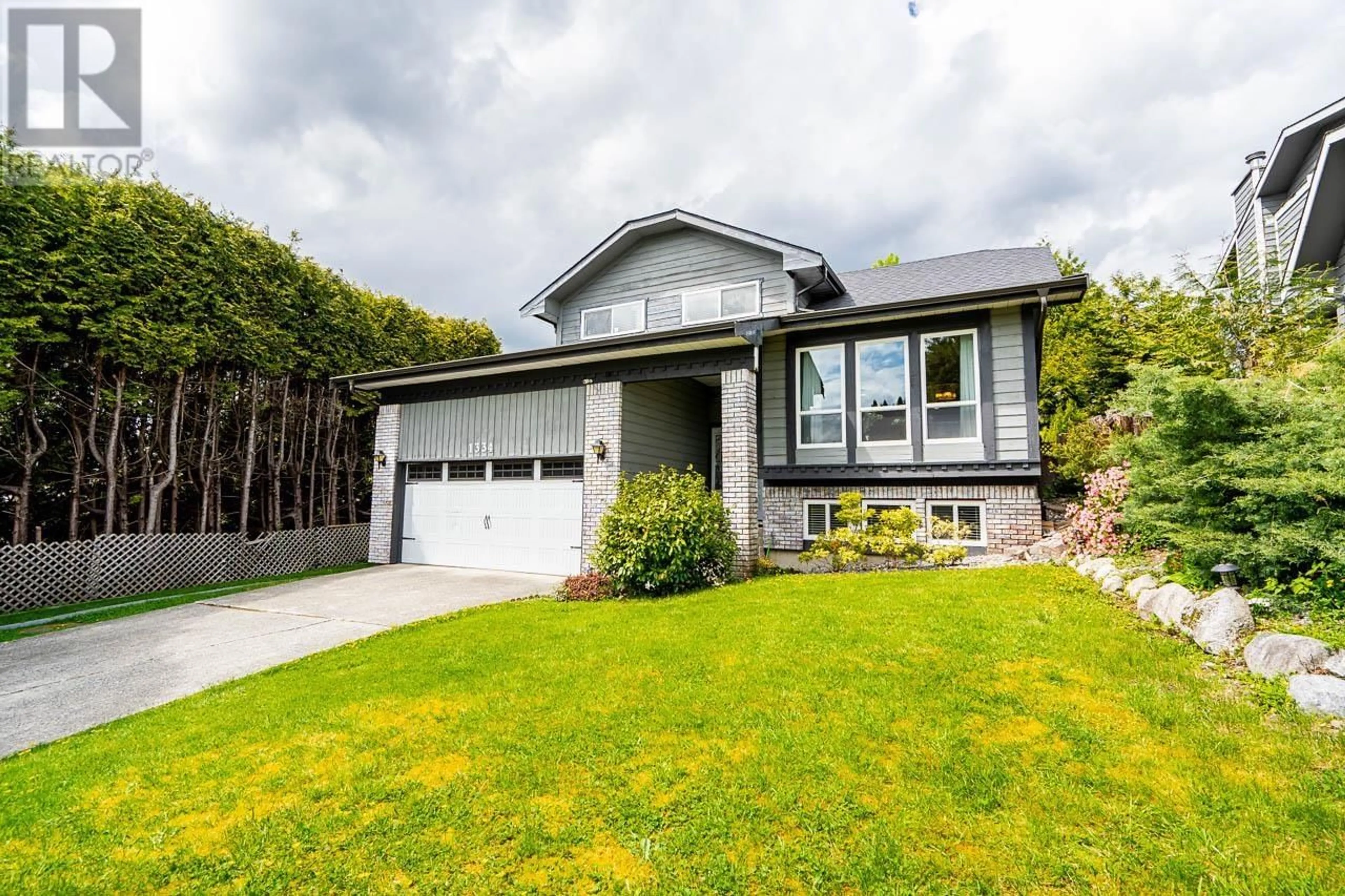 Home with vinyl exterior material, street for 1334 LANSDOWNE DRIVE, Coquitlam British Columbia V3E1K6