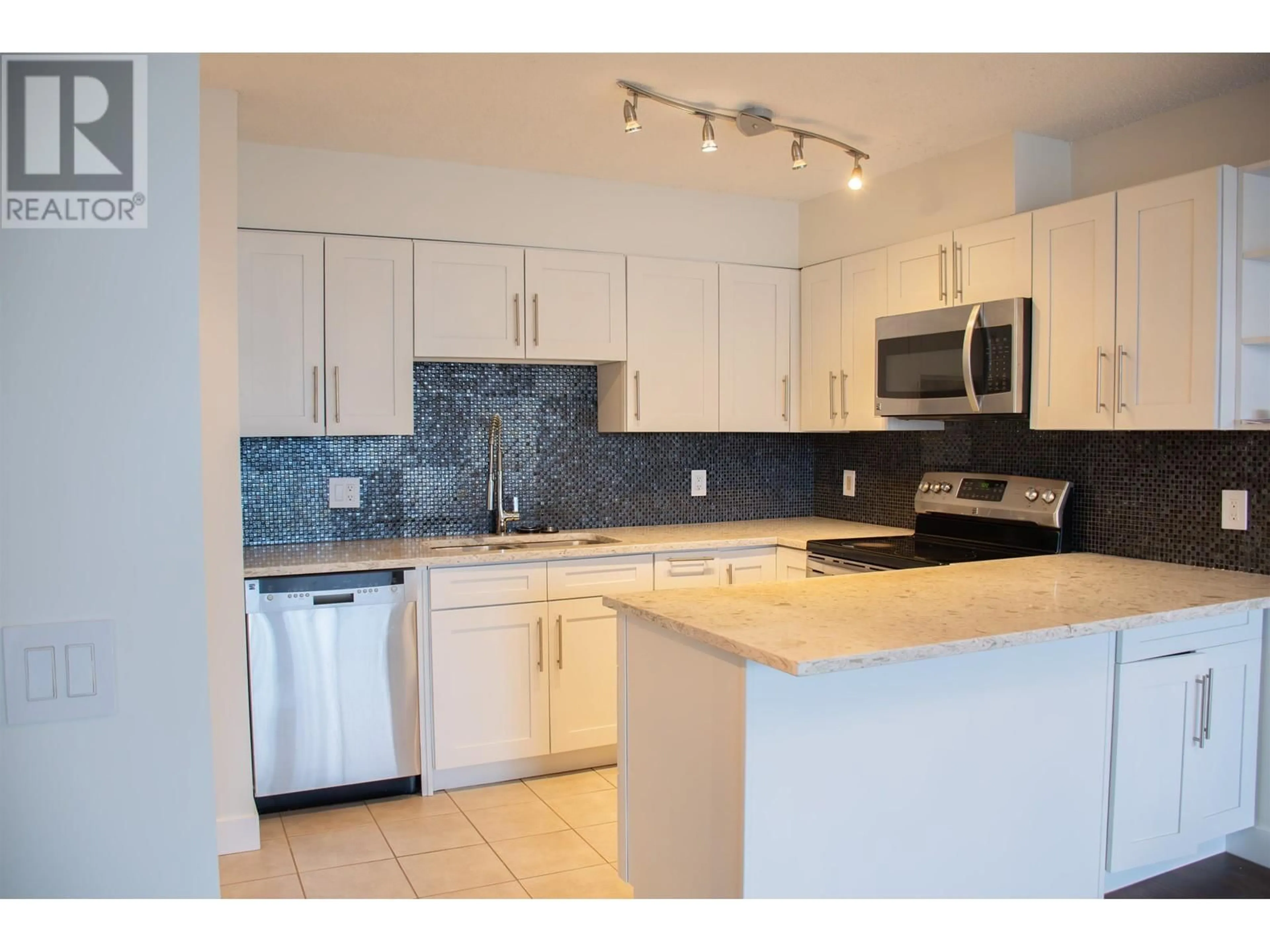 Standard kitchen, ceramic/tile floor for 1301 - 3970 CARRIGAN COURT, Burnaby British Columbia V3N4S5