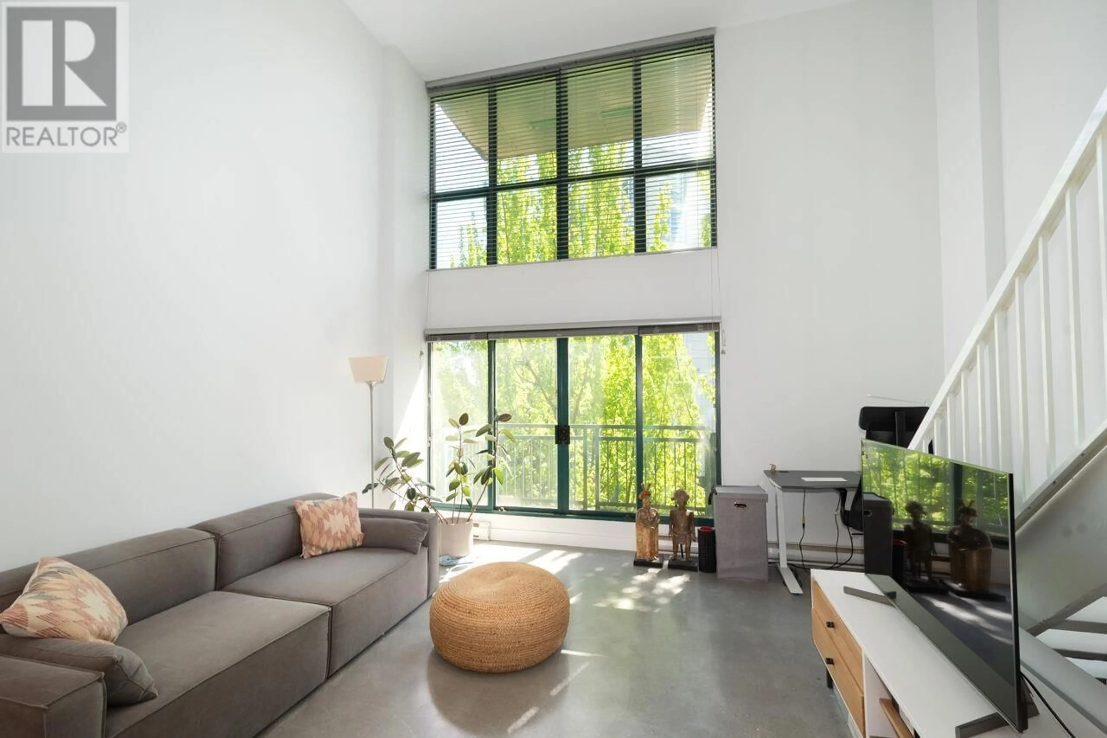 Living room with furniture, cement floor for 618 - 22 CORDOVA STREET, Vancouver British Columbia V6A4G8