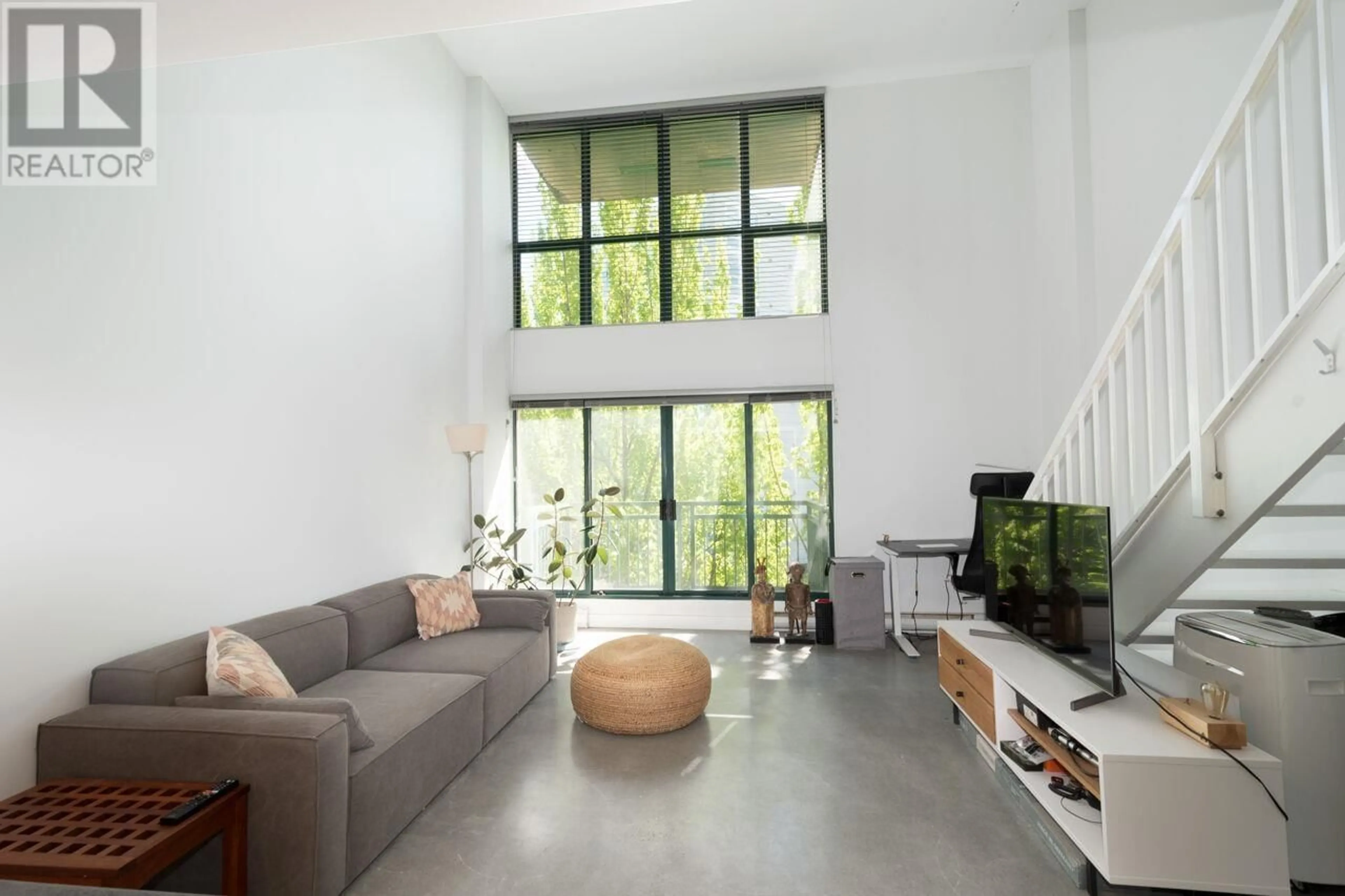 Living room with furniture, cement floor for 618 - 22 CORDOVA STREET, Vancouver British Columbia V6A4G8