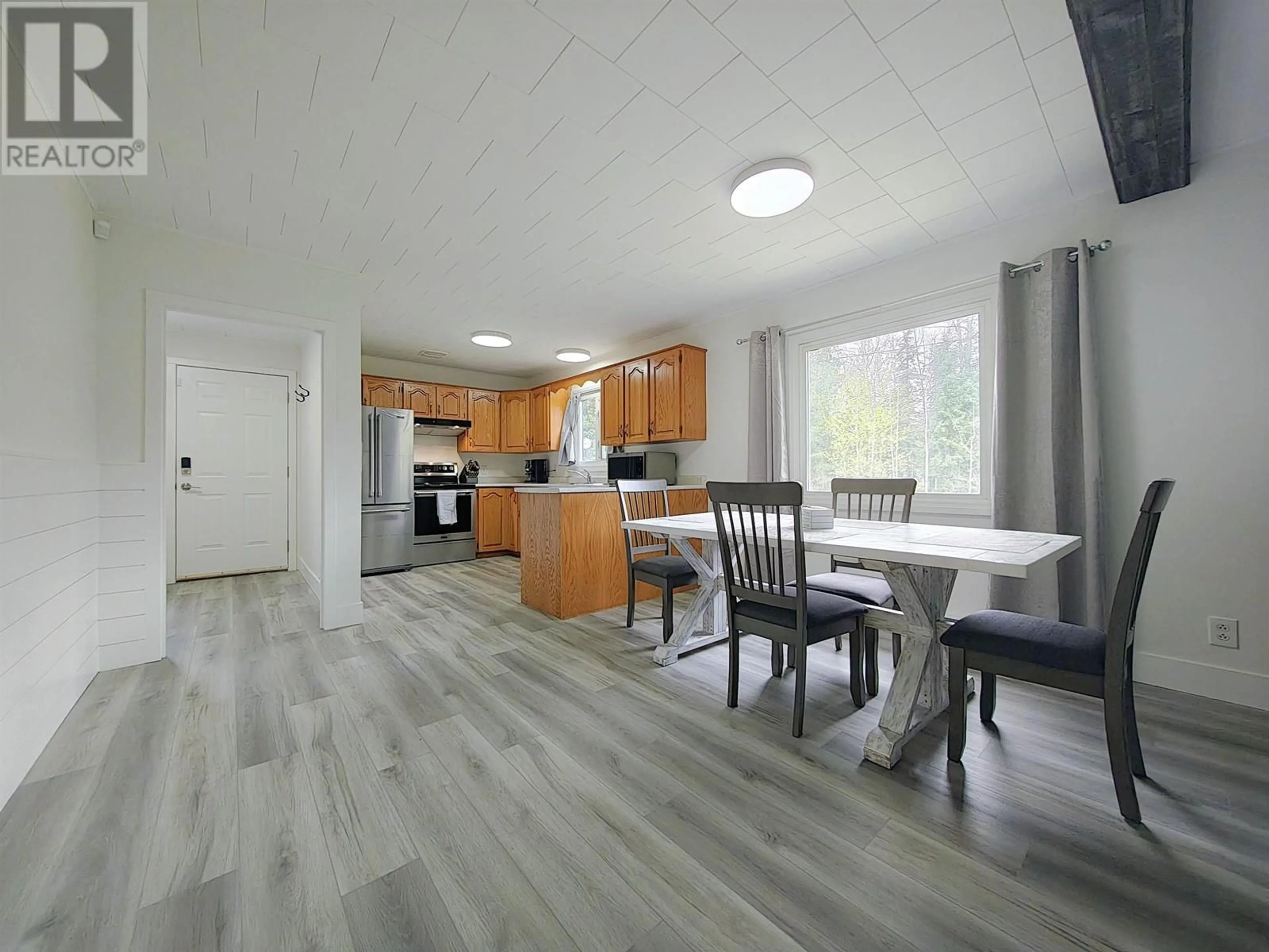 Open concept kitchen, wood/laminate floor for 426 MCKELVIE ROAD, Hixon British Columbia V0K1S1